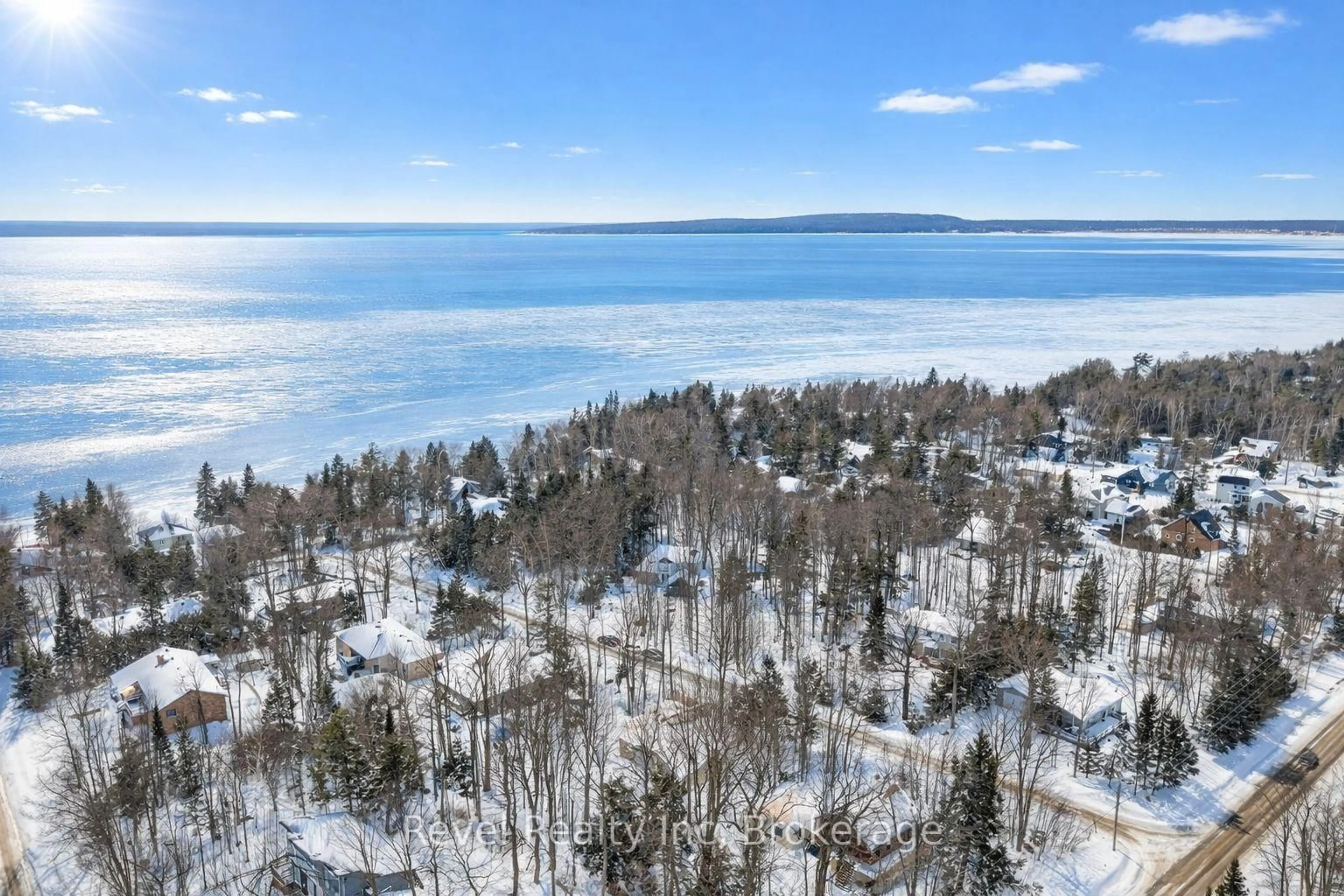 A pic from outside/outdoor area/front of a property/back of a property/a pic from drone, water/lake/river/ocean view for 8 Manitou Cres, Tiny Ontario L9M 0C6