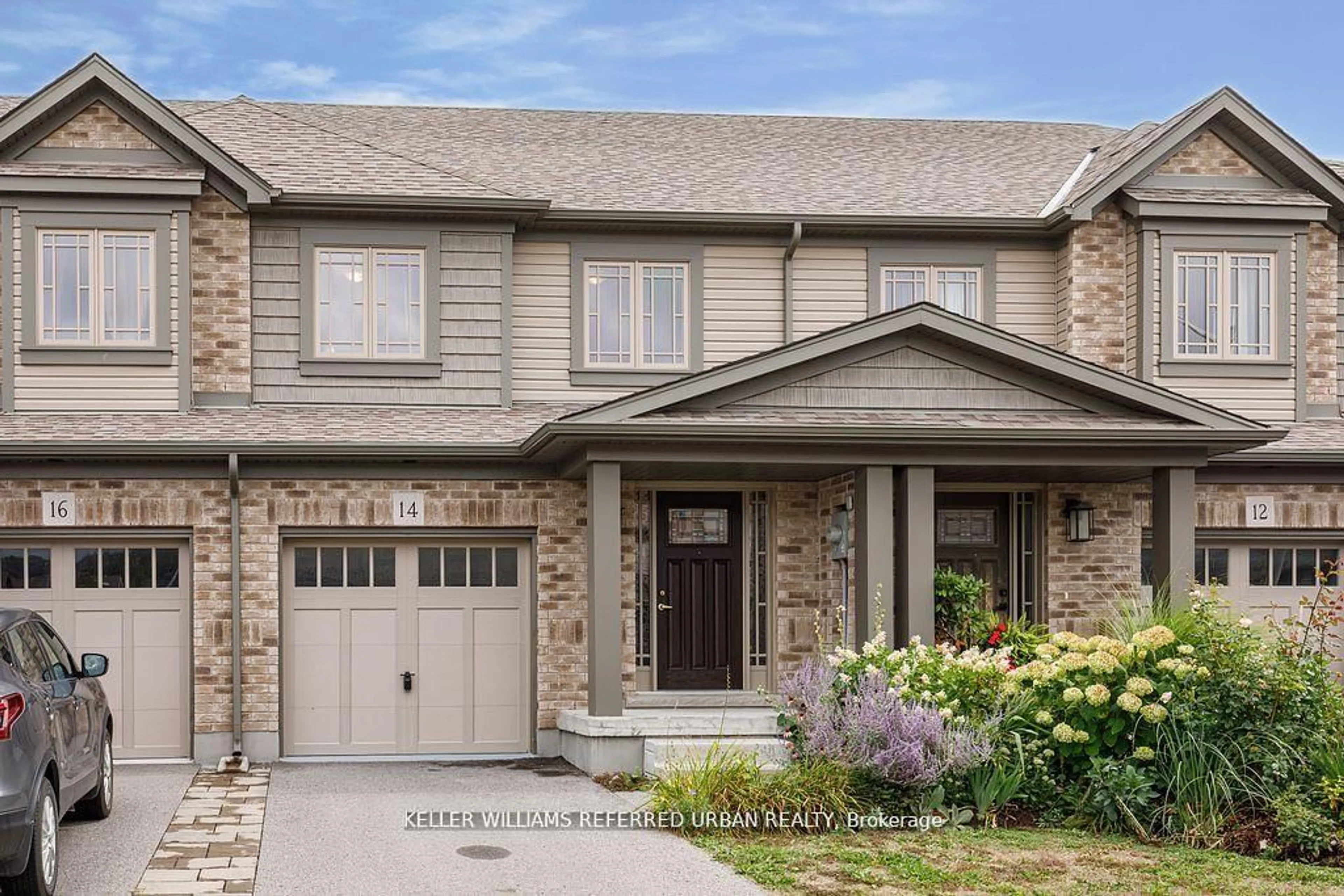 Home with brick exterior material, street for 14 Foley Cres, Collingwood Ontario L9Y 3B7