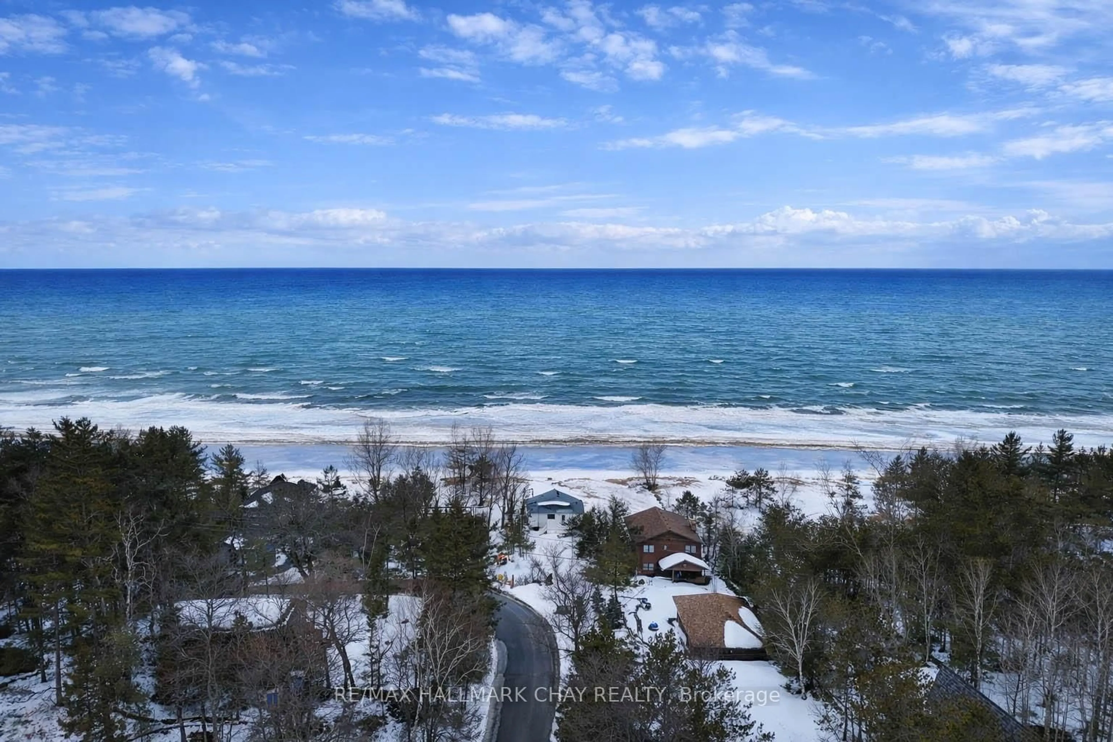 A pic from outside/outdoor area/front of a property/back of a property/a pic from drone, water/lake/river/ocean view for 1667 Tiny Beaches Rd, Tiny Ontario L0L 1P0