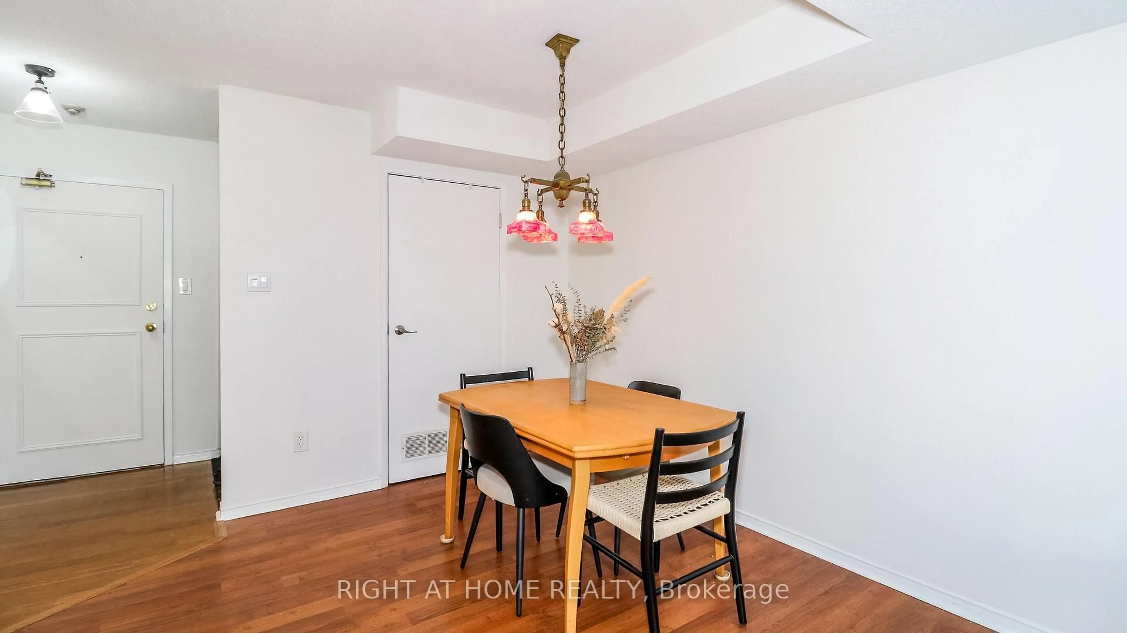 Dining room, wood/laminate floor for 126 Bell Farm Rd #113, Barrie Ontario L4M 6J3