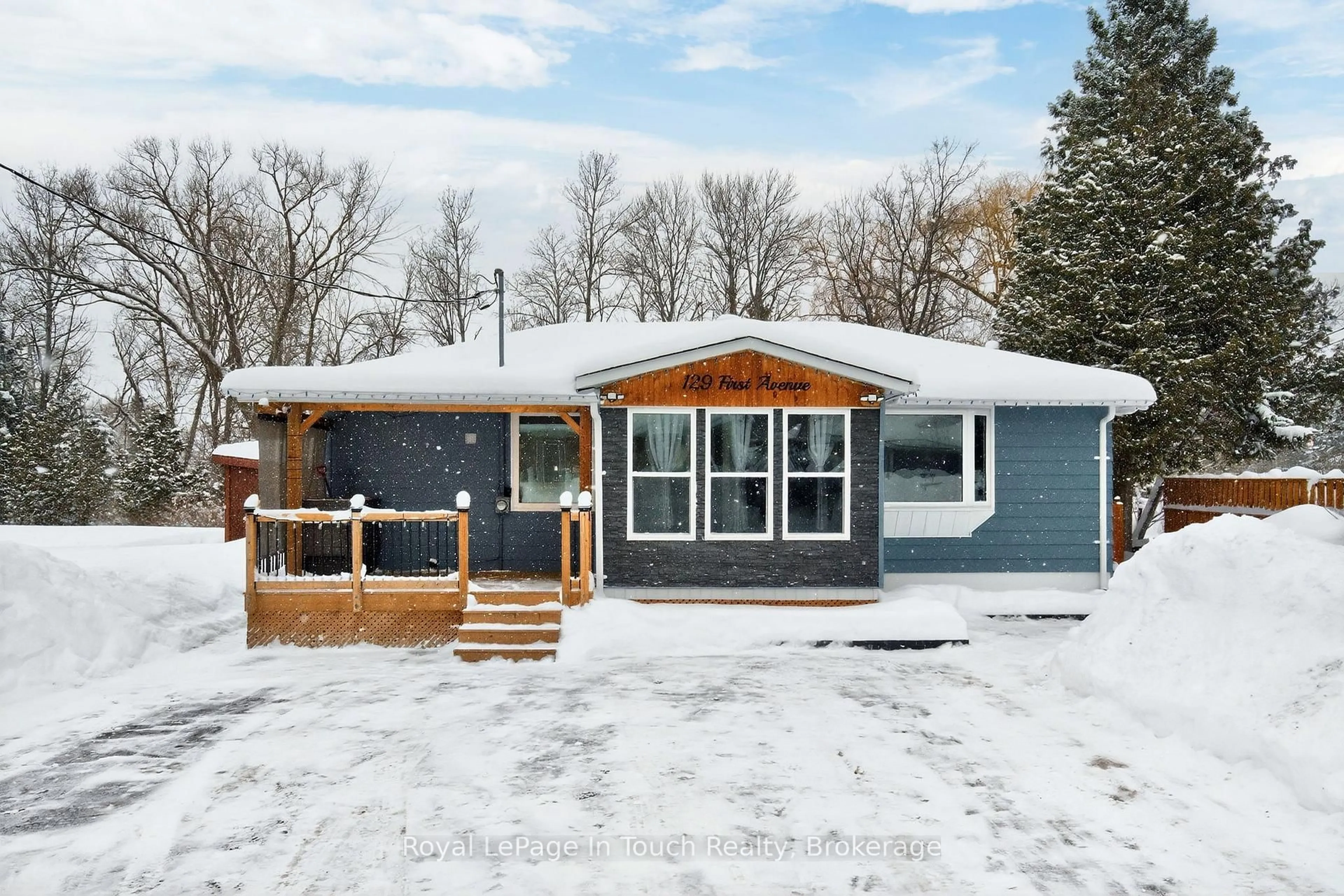 Home with vinyl exterior material, street for 129 First Ave, Tay Ontario L0K 1R0