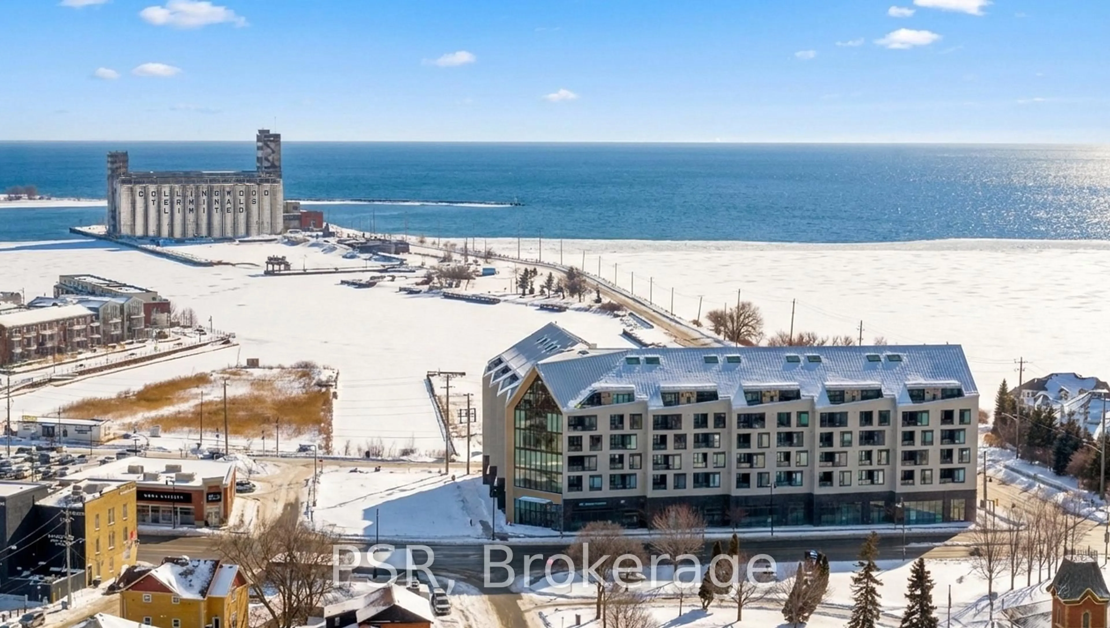 A pic from outside/outdoor area/front of a property/back of a property/a pic from drone, water/lake/river/ocean view for 31 Huron St #311, Collingwood Ontario L9Y 5T7