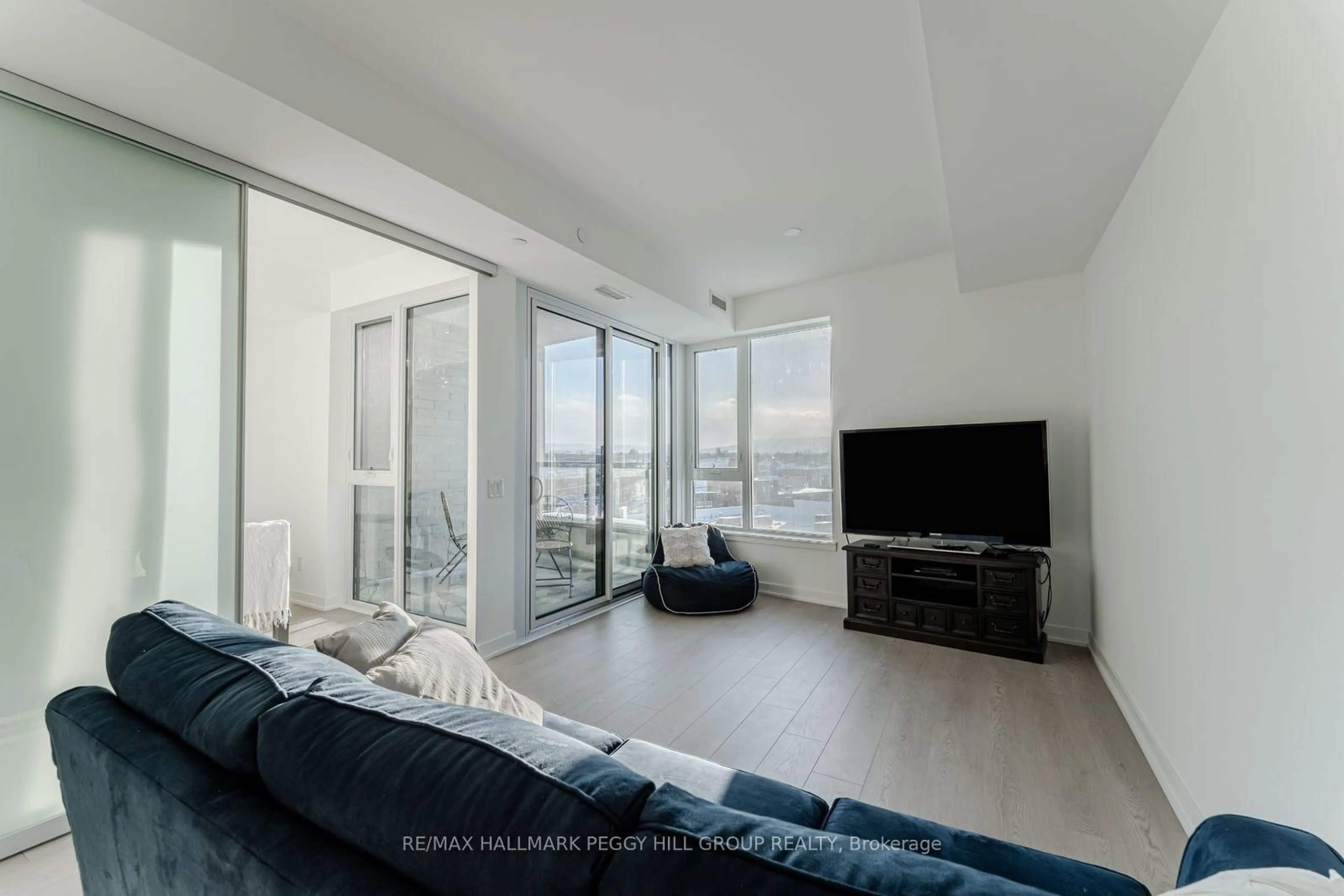 Living room with furniture, unknown for 31 Huron St #421, Collingwood Ontario L9Y 5T7