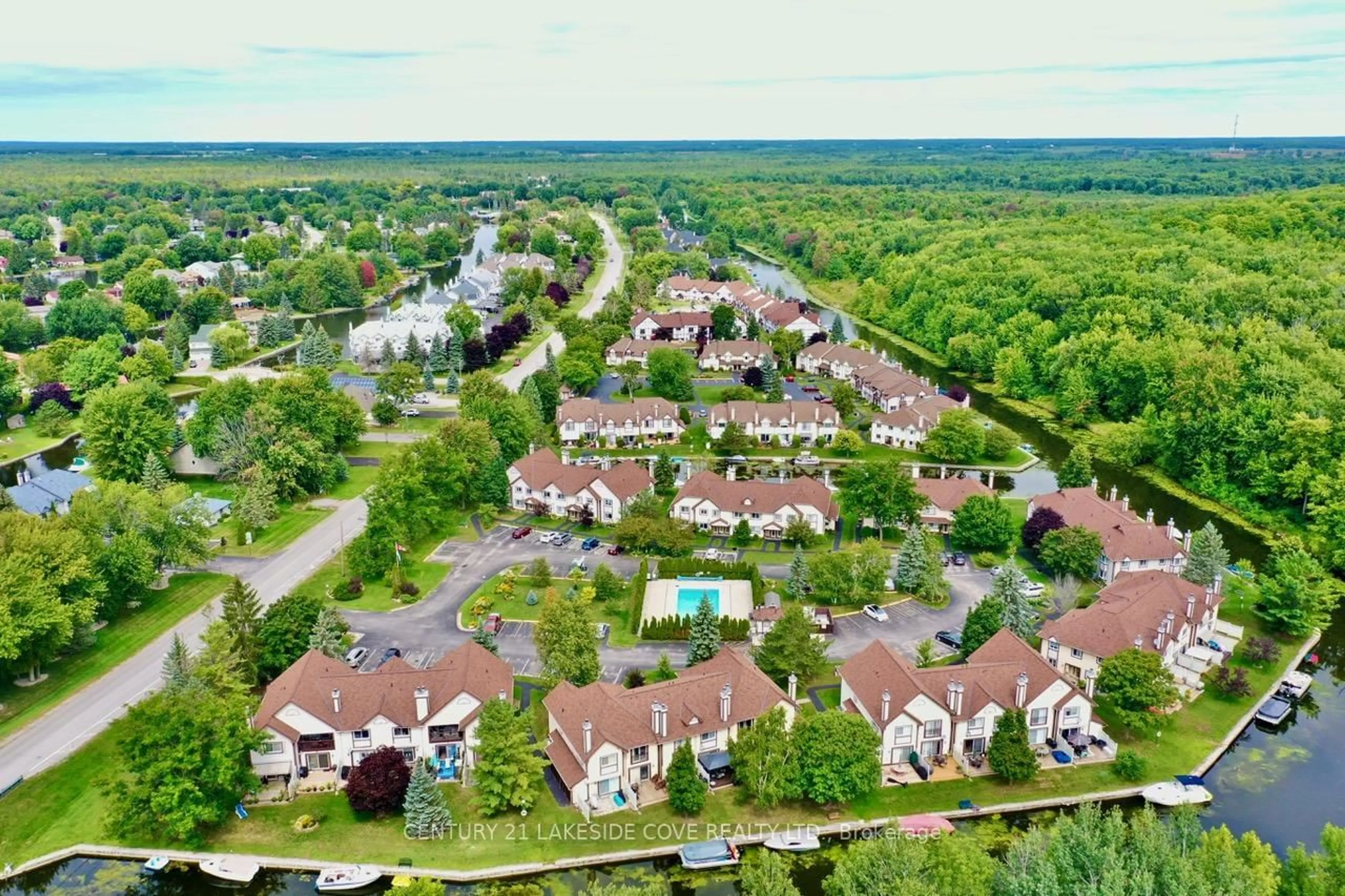 A pic from outside/outdoor area/front of a property/back of a property/a pic from drone, unknown for 11 Laguna Pkwy #1, Ramara Ontario L0K 1B0