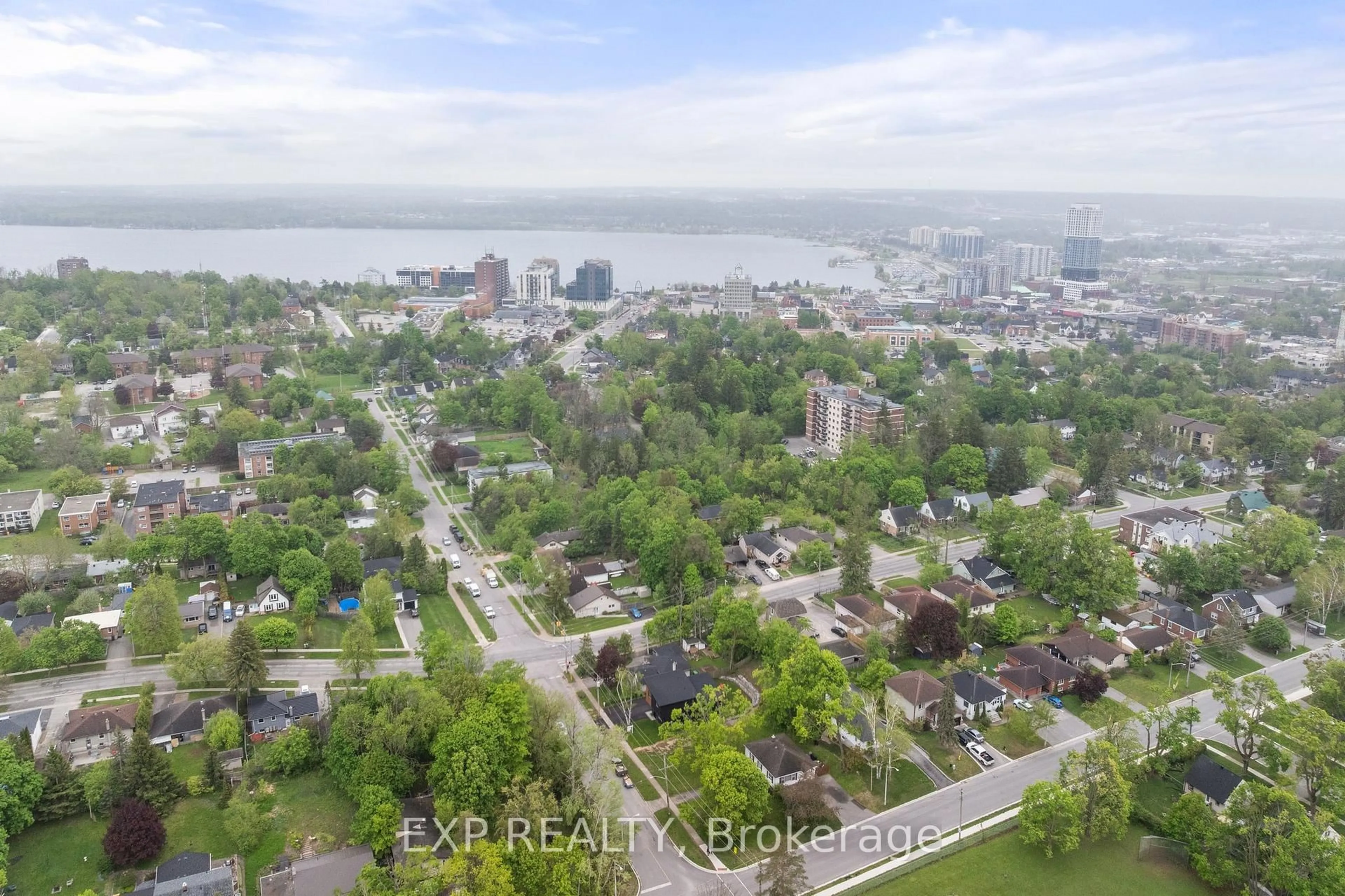 A pic from outside/outdoor area/front of a property/back of a property/a pic from drone, water/lake/river/ocean view for 168 Berczy St, Barrie Ontario L4M 3R6