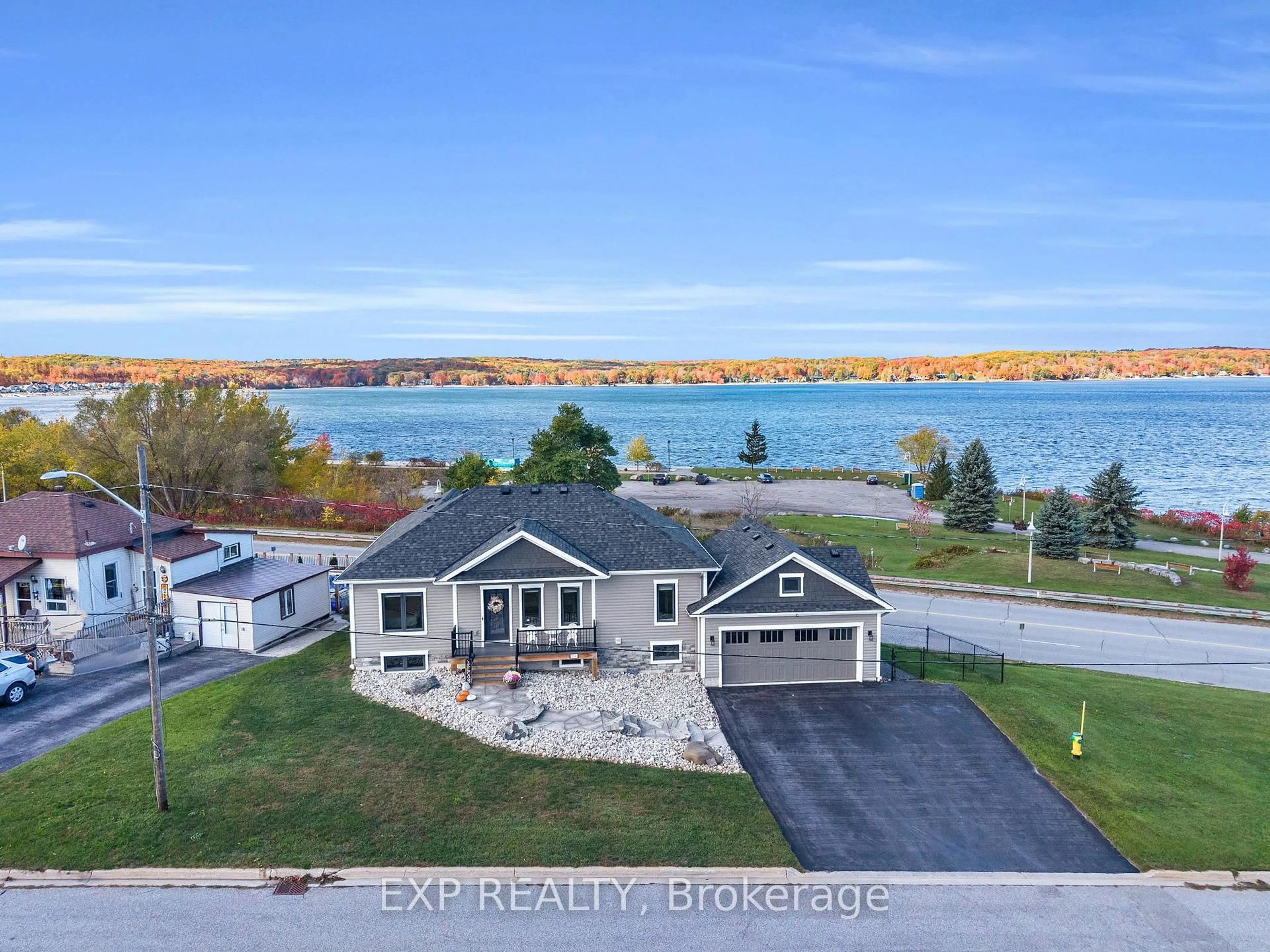 A pic from outside/outdoor area/front of a property/back of a property/a pic from drone, water/lake/river/ocean view for 244 Frank St, Midland Ontario L4R 1H4