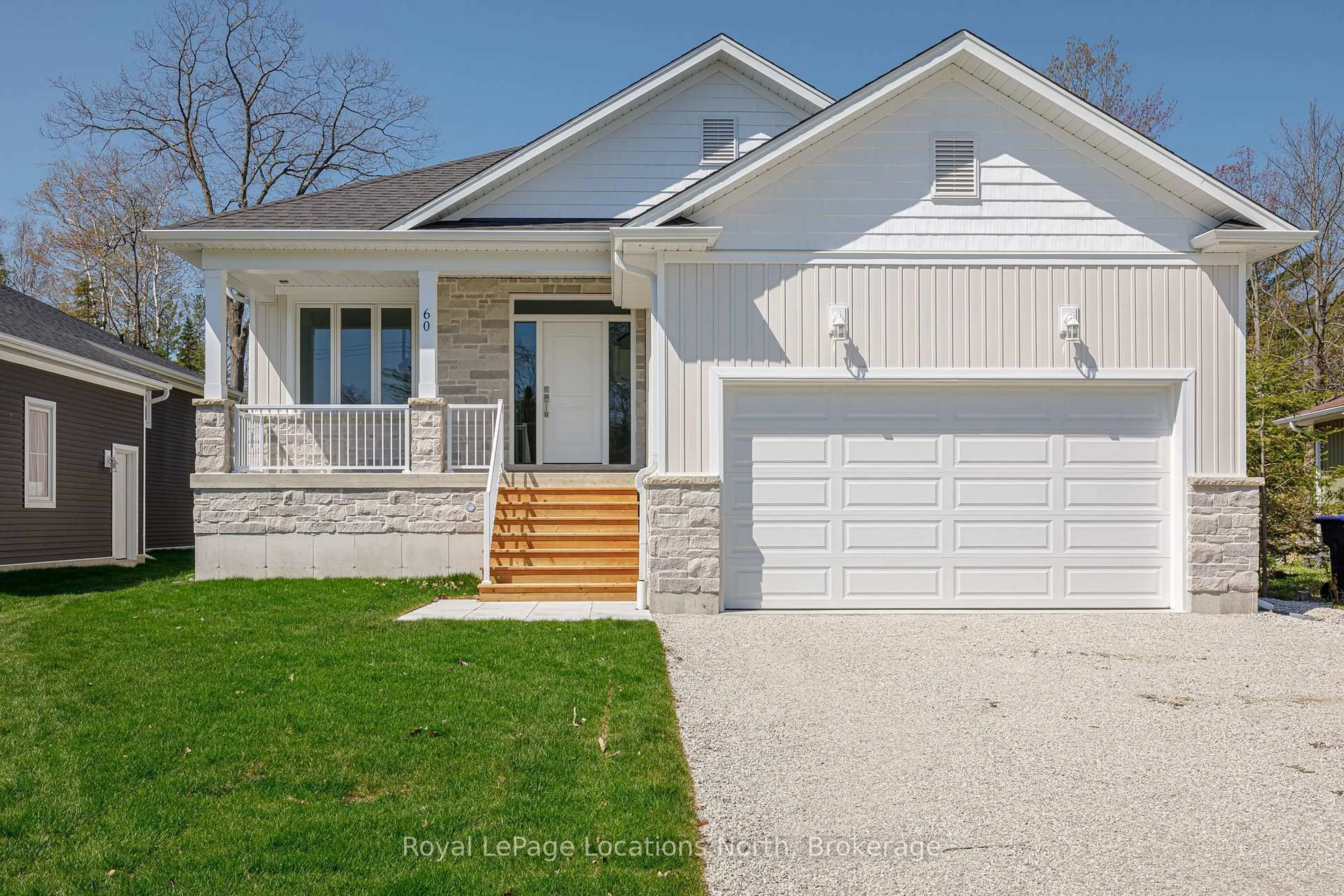 Home with brick exterior material, street for 60 52nd St, Wasaga Beach Ontario L0M 1P0