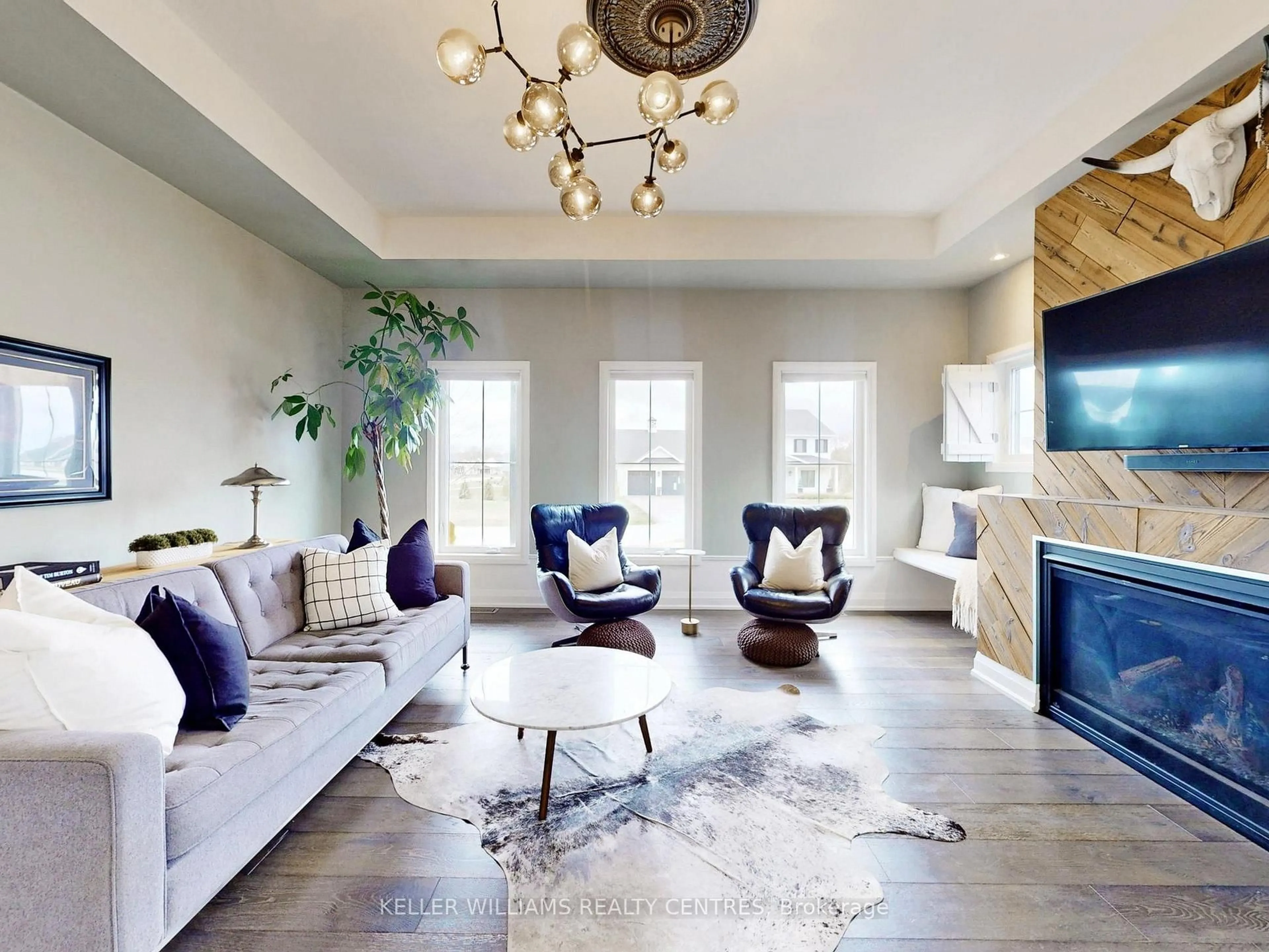 Living room with furniture, unknown for 2 Thoroughbred Dr, Oro-Medonte Ontario L0K 1E0