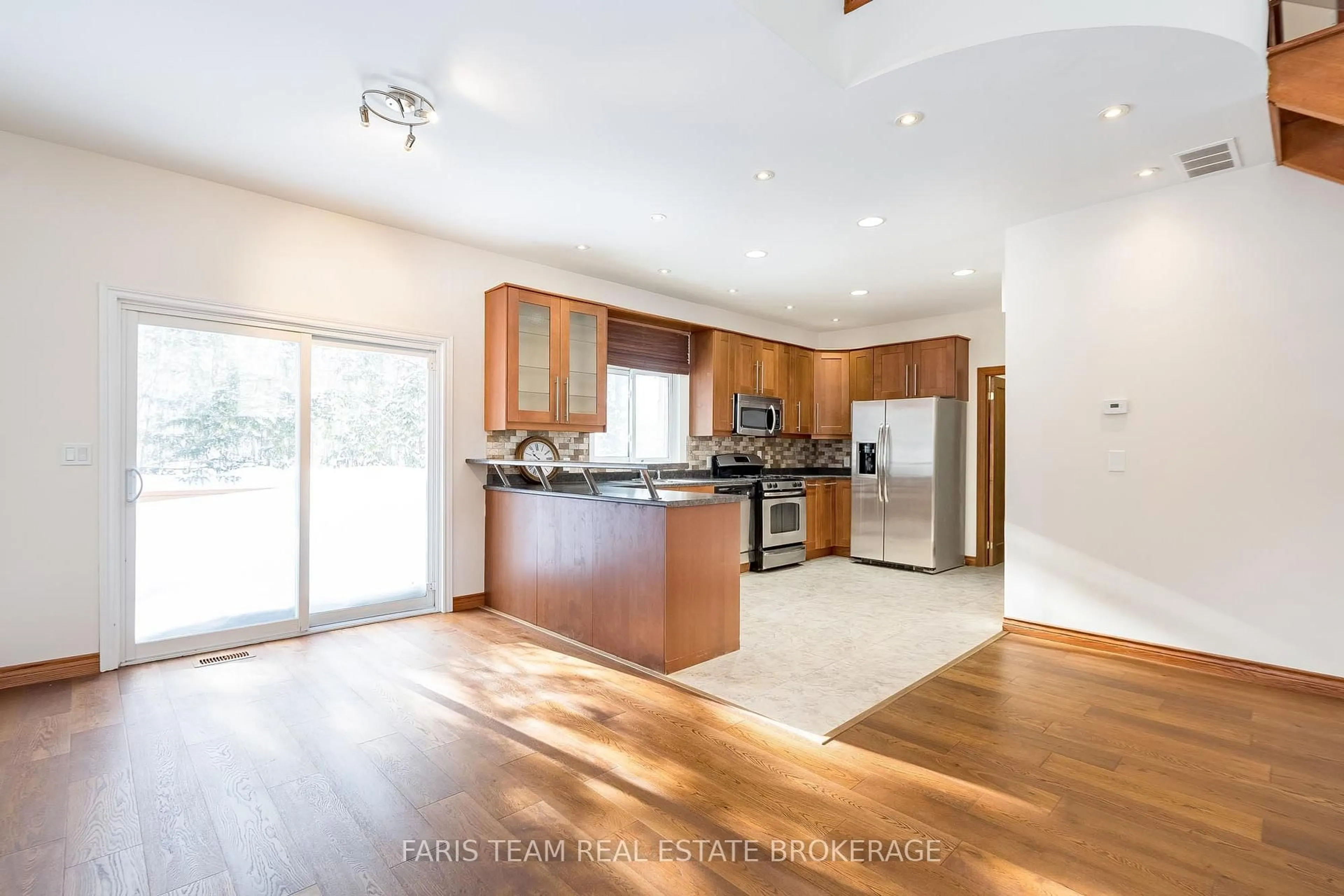 Open concept kitchen, unknown for 2384 Champlain Rd, Tiny Ontario L9M 0C9