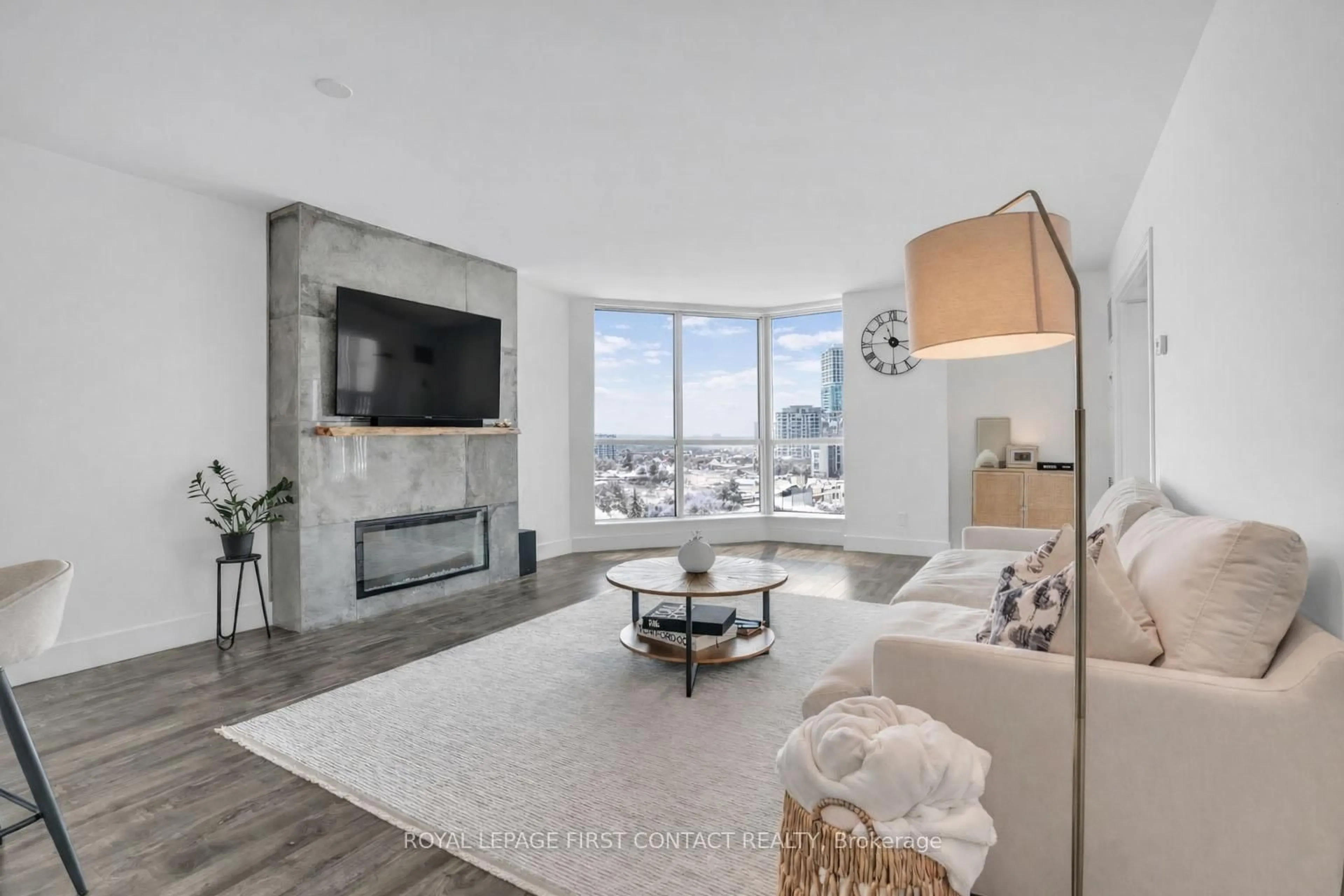 Living room with furniture, unknown for 140 Dunlop St #605, Barrie Ontario L4M 6H9