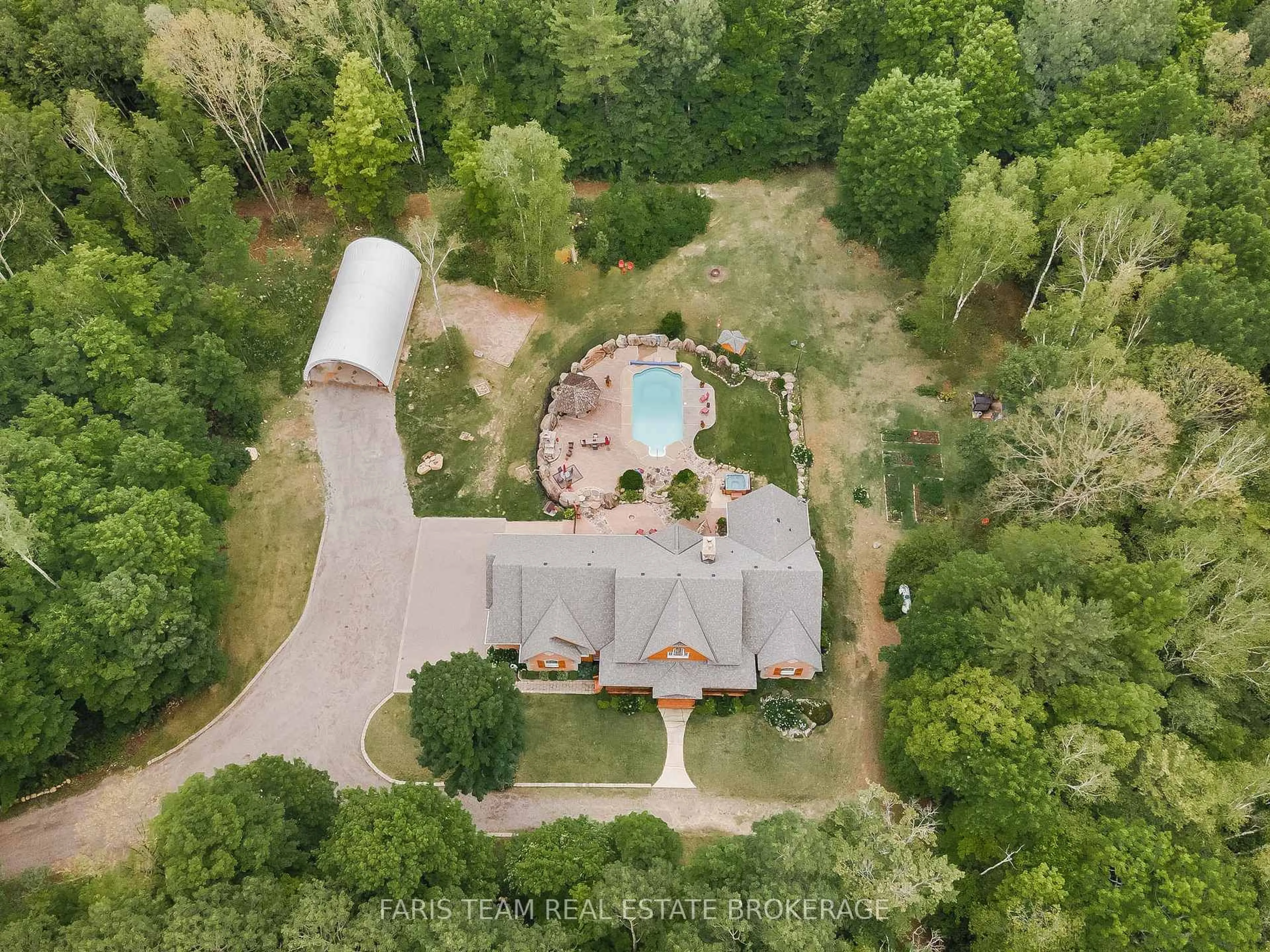 A pic from outside/outdoor area/front of a property/back of a property/a pic from drone, forest/trees view for 697 Lafontaine Rd, Tiny Ontario L9M 0S5