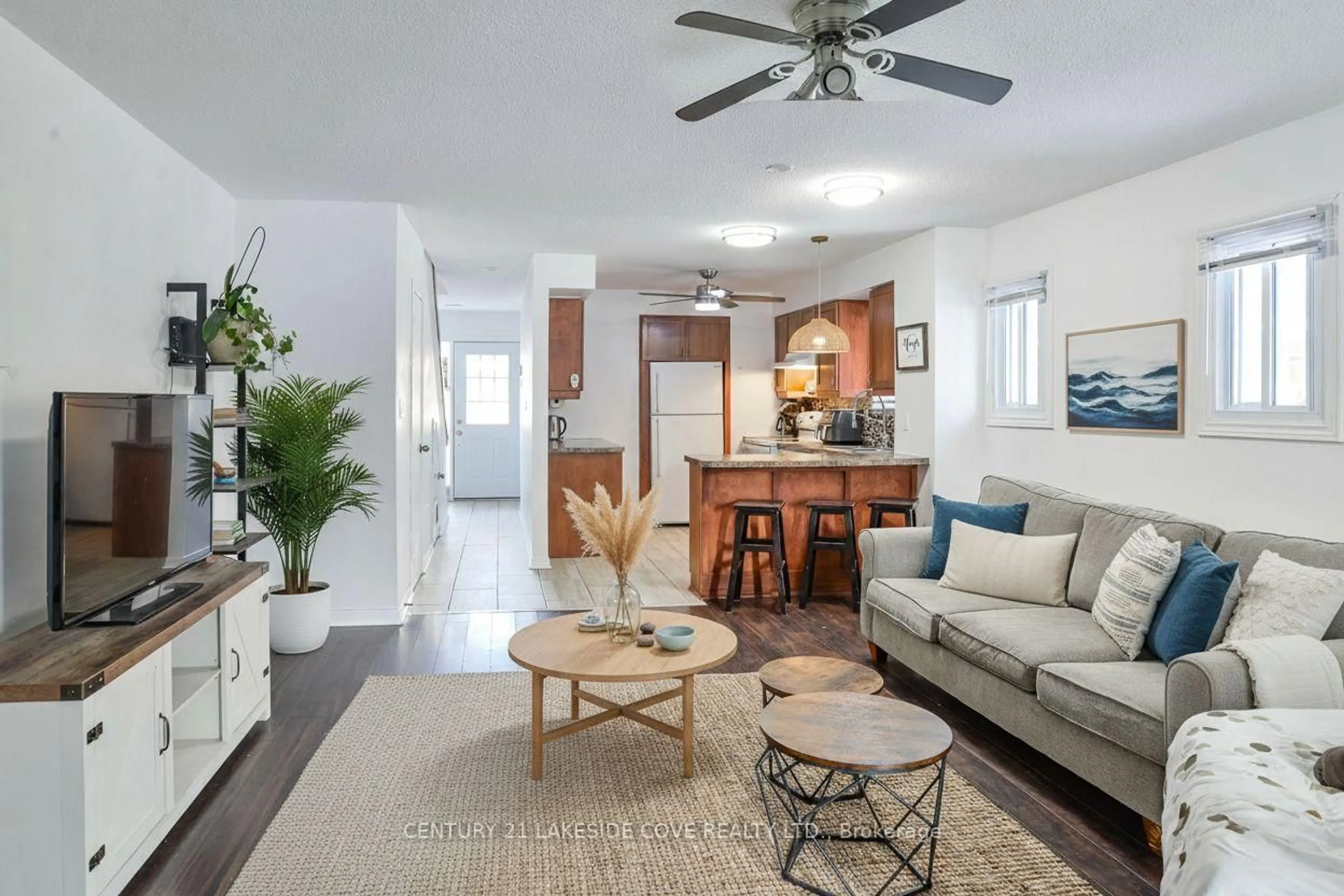 Living room with furniture, ceramic/tile floor for 4 Paradise Blvd #Unit 5, Ramara Ontario L0K 1B0