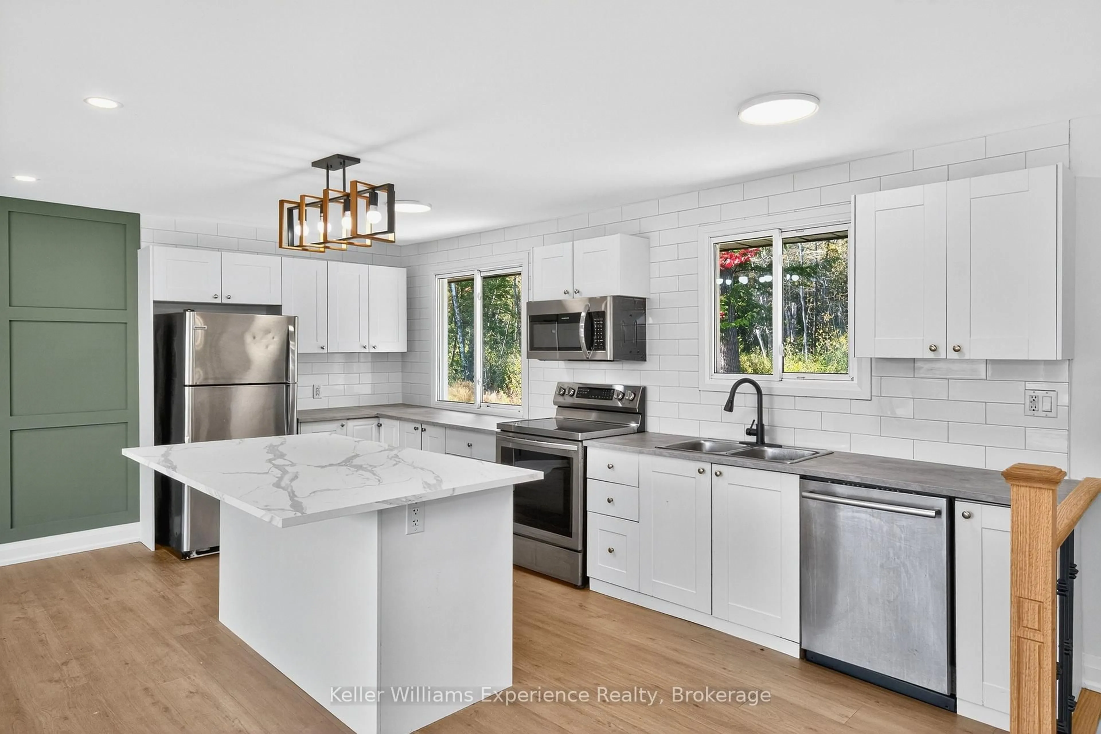 Open concept kitchen, ceramic/tile floor for 556 Champlain Rd, Tiny Ontario L9M 0C2