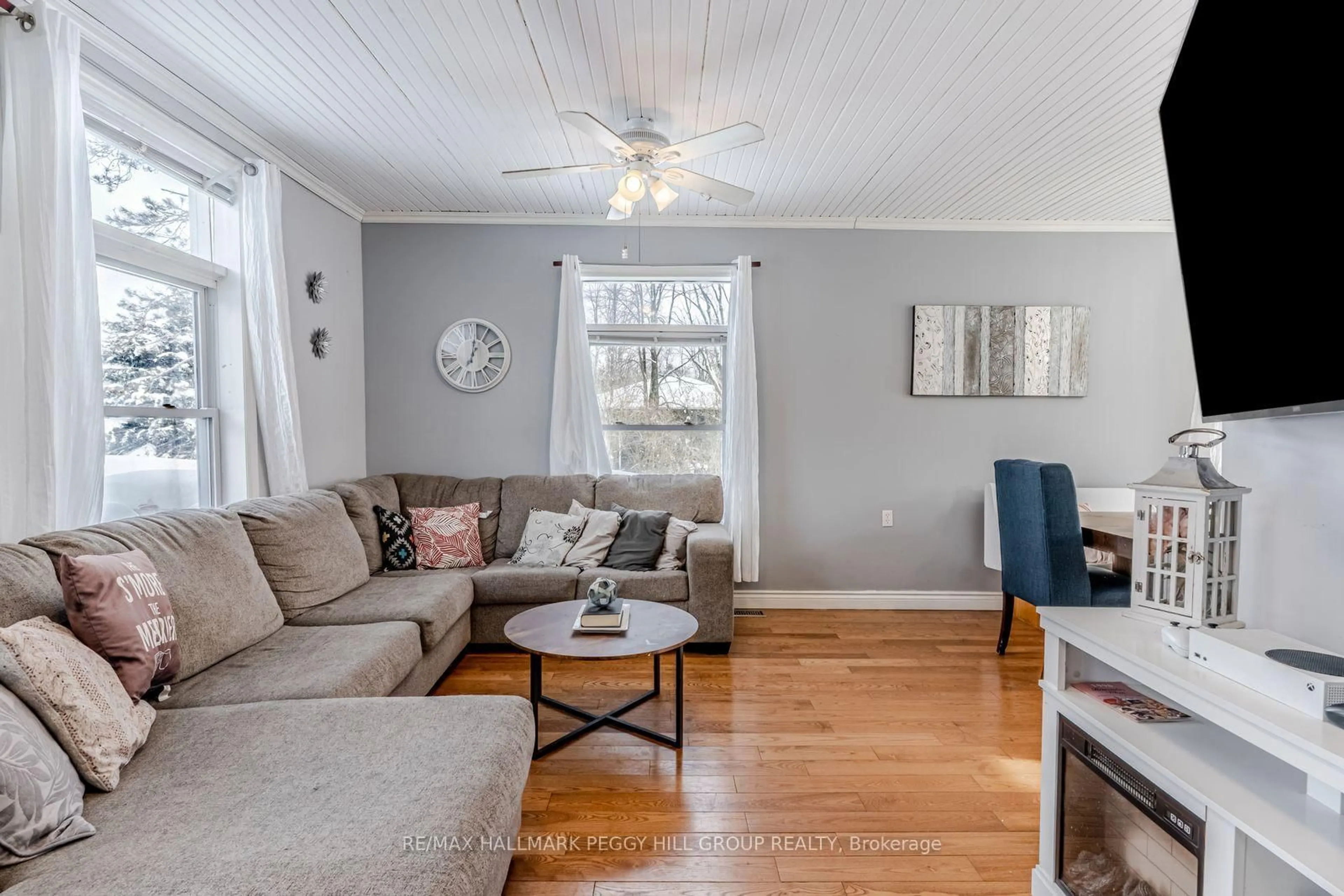 Living room with furniture, wood/laminate floor for 2917 Fairgrounds Rd, Ramara Ontario L0K 2B0