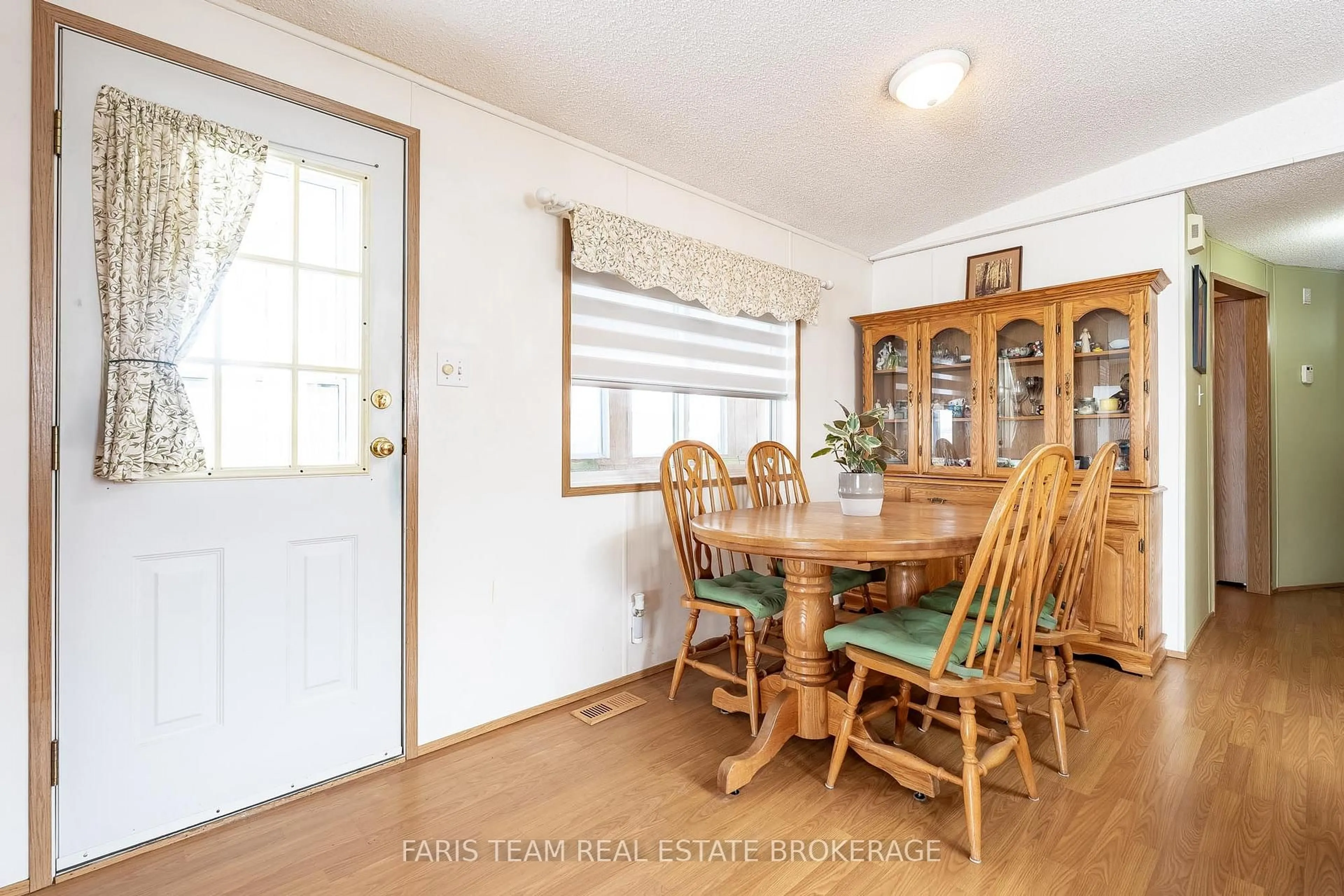 Dining room, wood/laminate floor for 1407 Fox Rd, Severn Ontario L3V 0V4