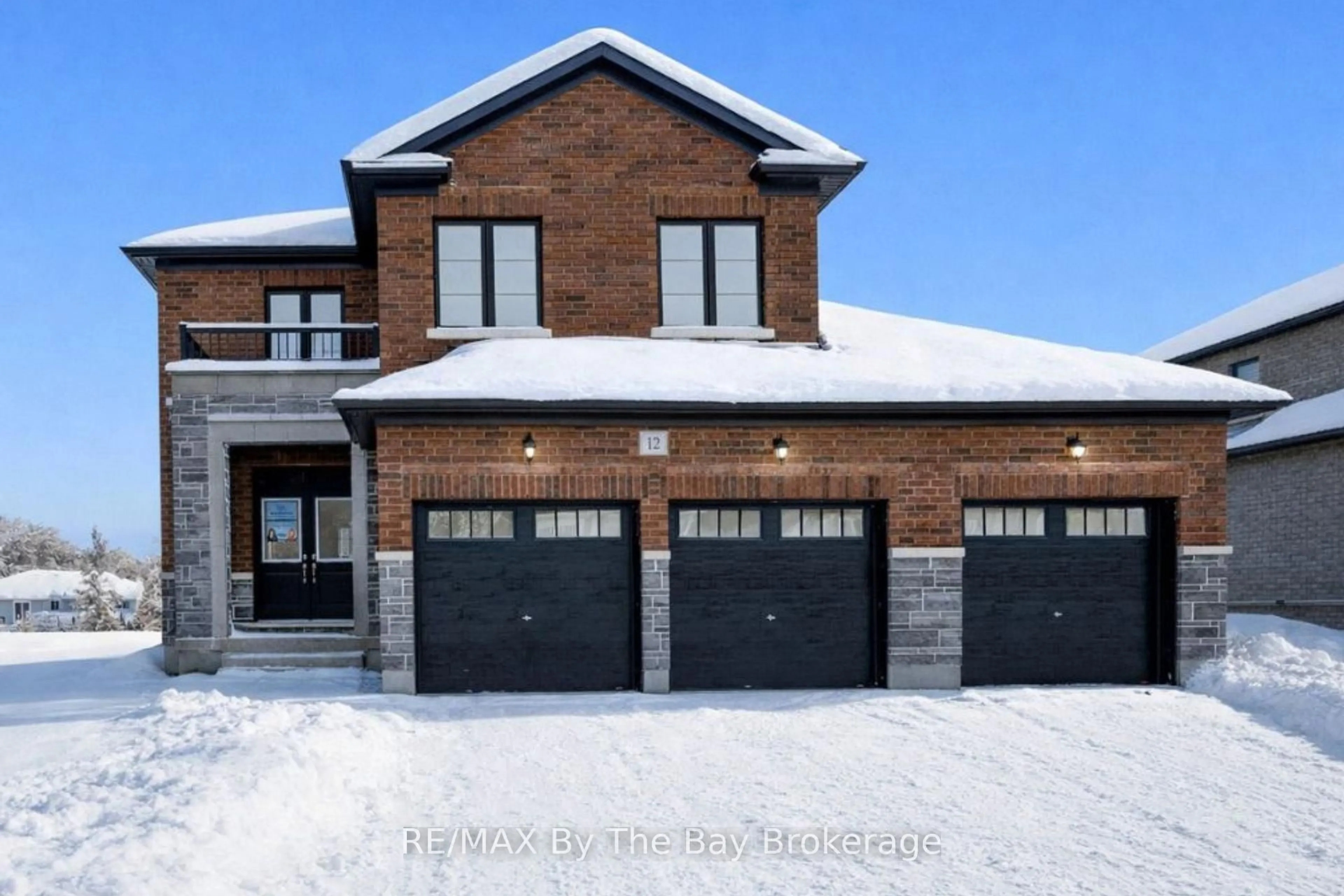 Home with brick exterior material, street for 12 Misty Ridge Rd, Wasaga Beach Ontario L9Z 0R8