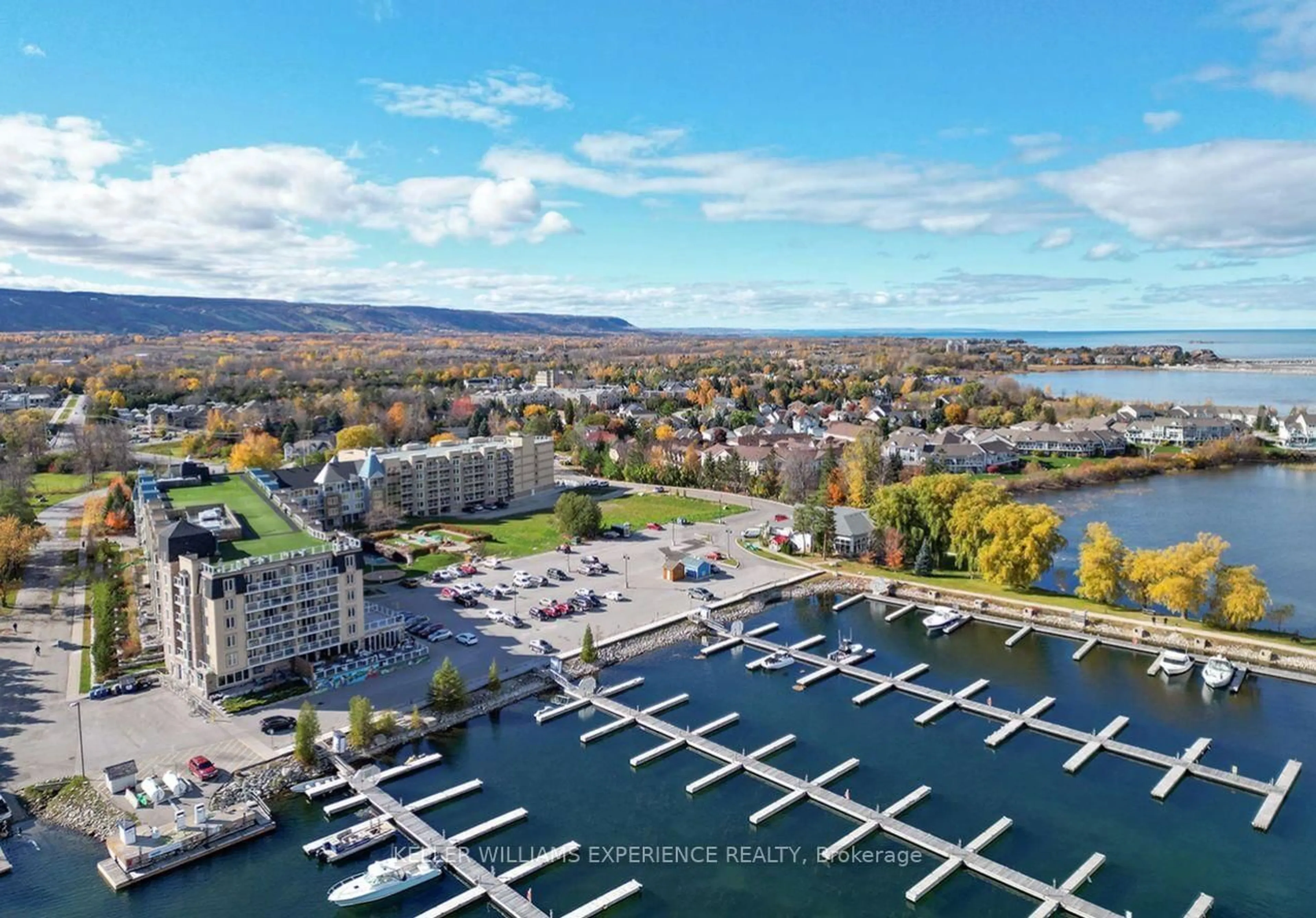 A pic from outside/outdoor area/front of a property/back of a property/a pic from drone, water/lake/river/ocean view for 9 Harbour St #3112/14, Collingwood Ontario L9Y 5B5