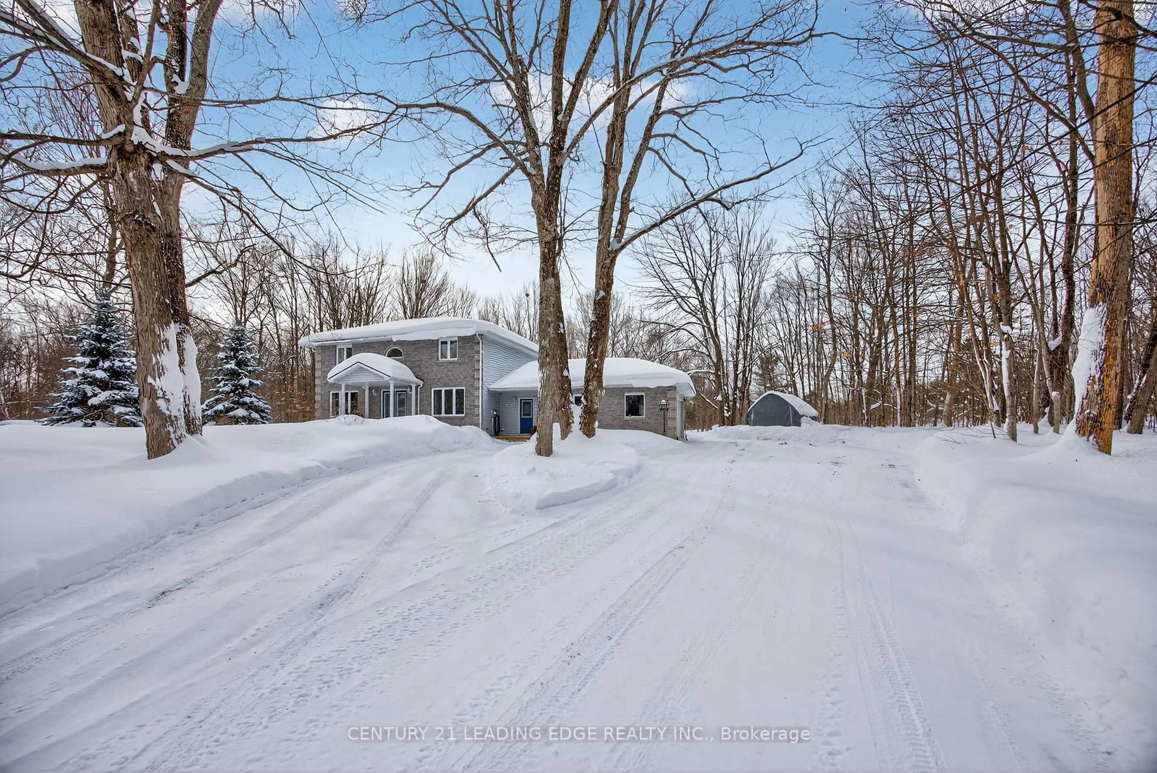 A pic from outside/outdoor area/front of a property/back of a property/a pic from drone, street for 5810 Lowanda Lane, Ramara Ontario L0K 1W0