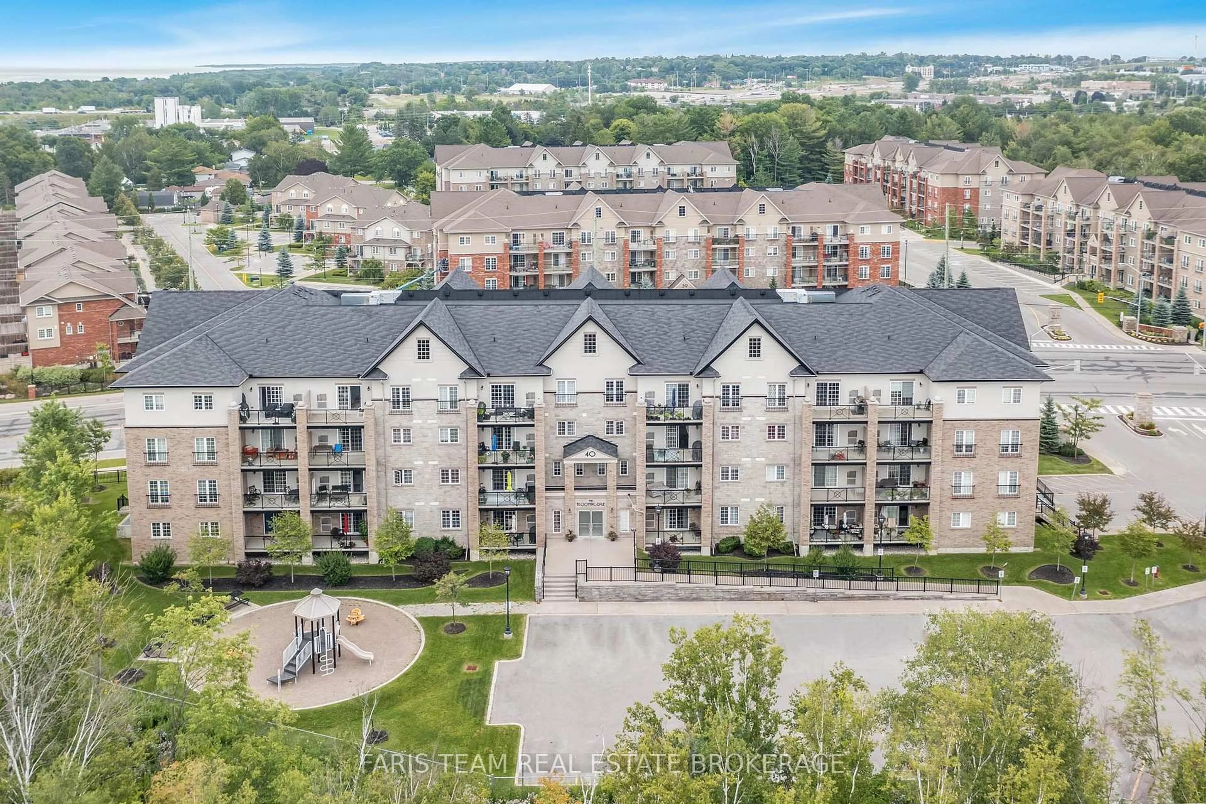 A pic from outside/outdoor area/front of a property/back of a property/a pic from drone, city buildings view from balcony for 40 Ferndale Dr #210, Barrie Ontario L4N 2L3