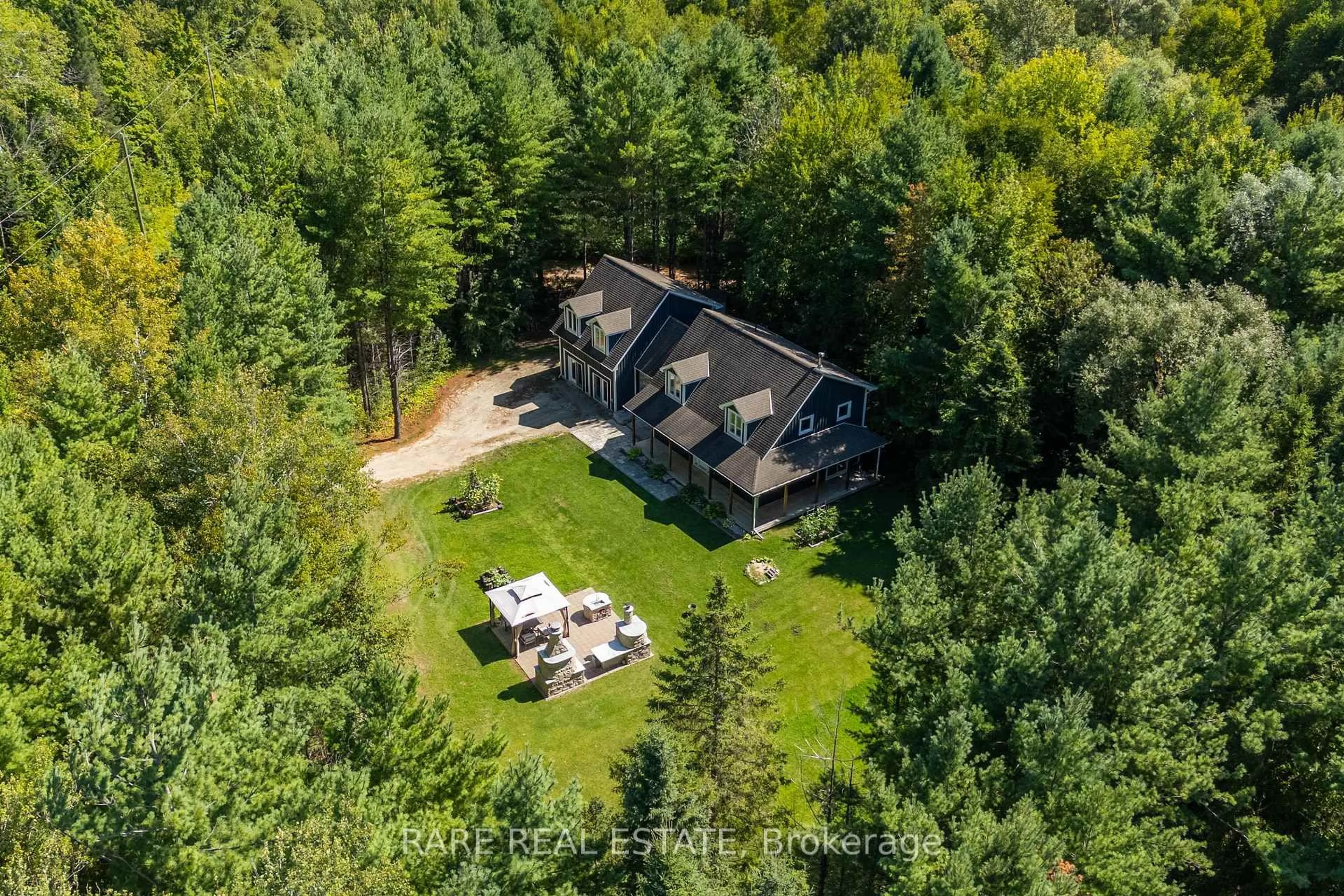A pic from outside/outdoor area/front of a property/back of a property/a pic from drone, forest/trees view for 6543 Concession Road 2 Rd, Clearview Ontario L0M 1N0