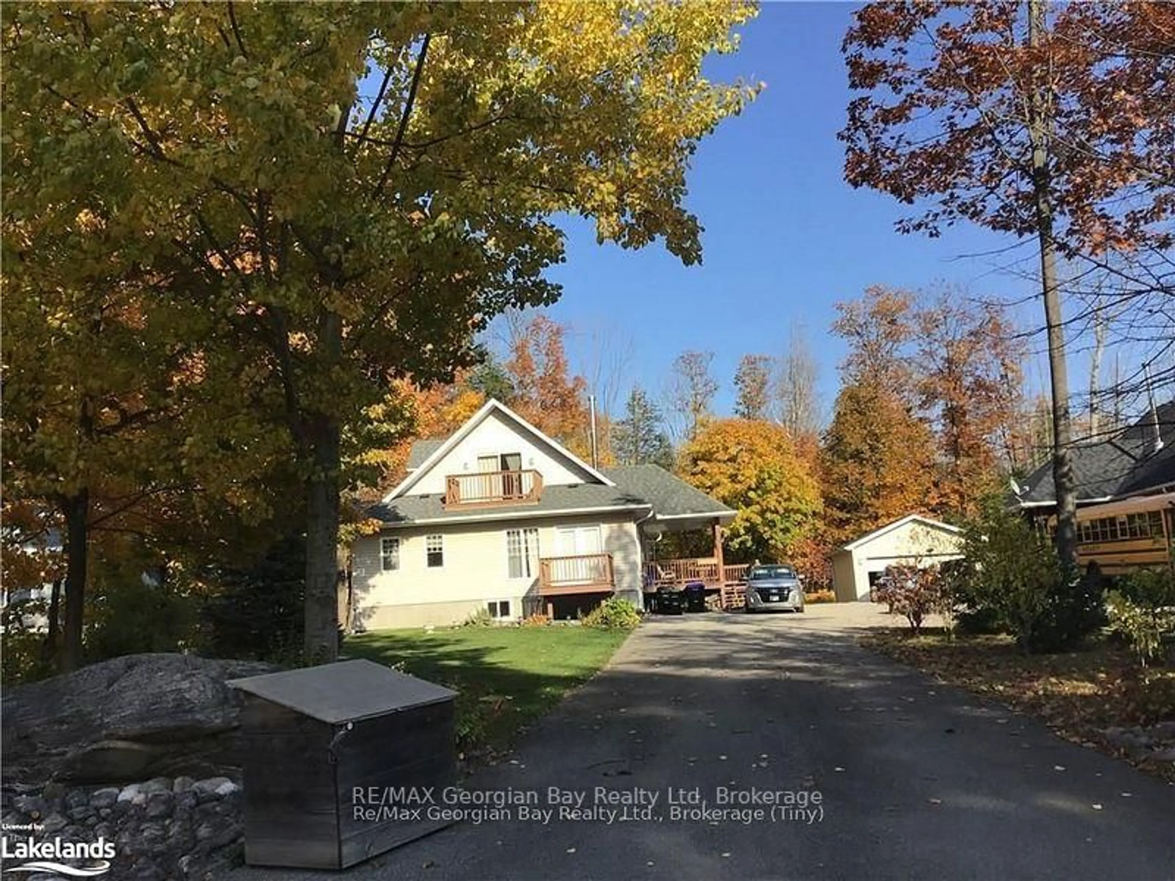 A pic from outside/outdoor area/front of a property/back of a property/a pic from drone, street for 139 Trout Lane, Tiny Ontario L9M 0J1