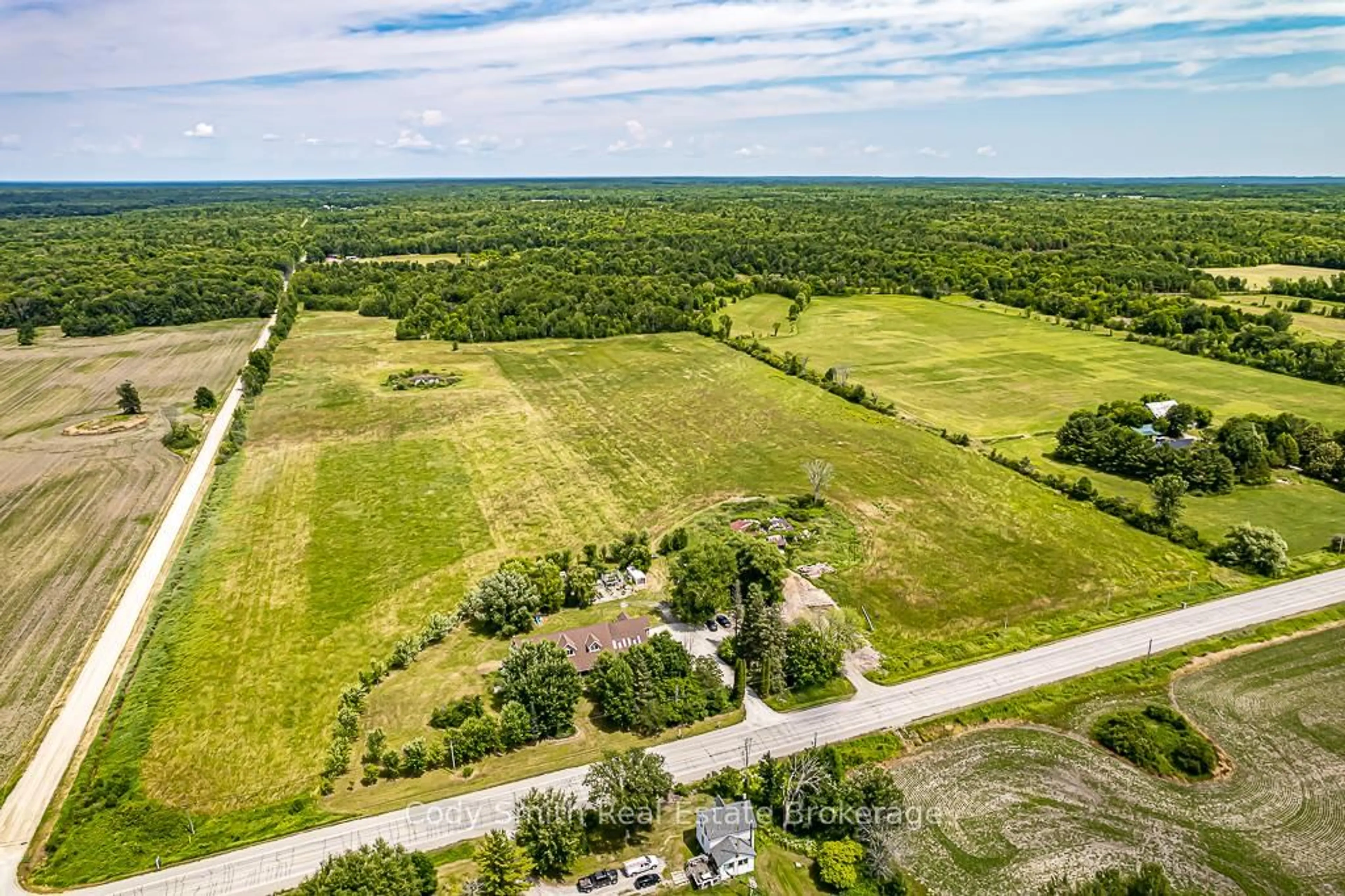 A pic from outside/outdoor area/front of a property/back of a property/a pic from drone, forest/trees view for 2059 Upper Big Chute Rd, Severn Ontario L0K 1E0