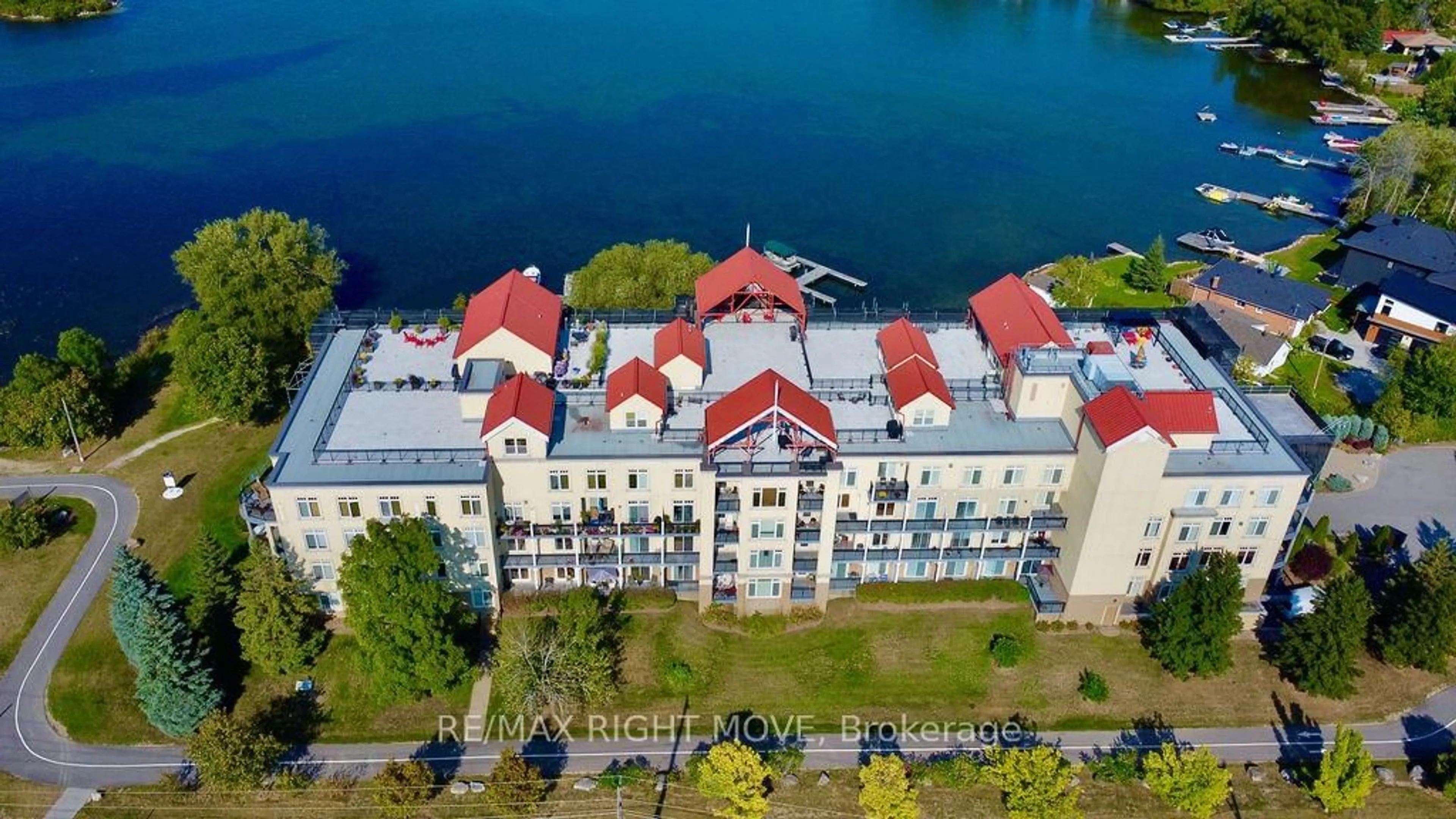 A pic from outside/outdoor area/front of a property/back of a property/a pic from drone, unknown for 140 Cedar Island Rd #410, Orillia Ontario L3V 1T1