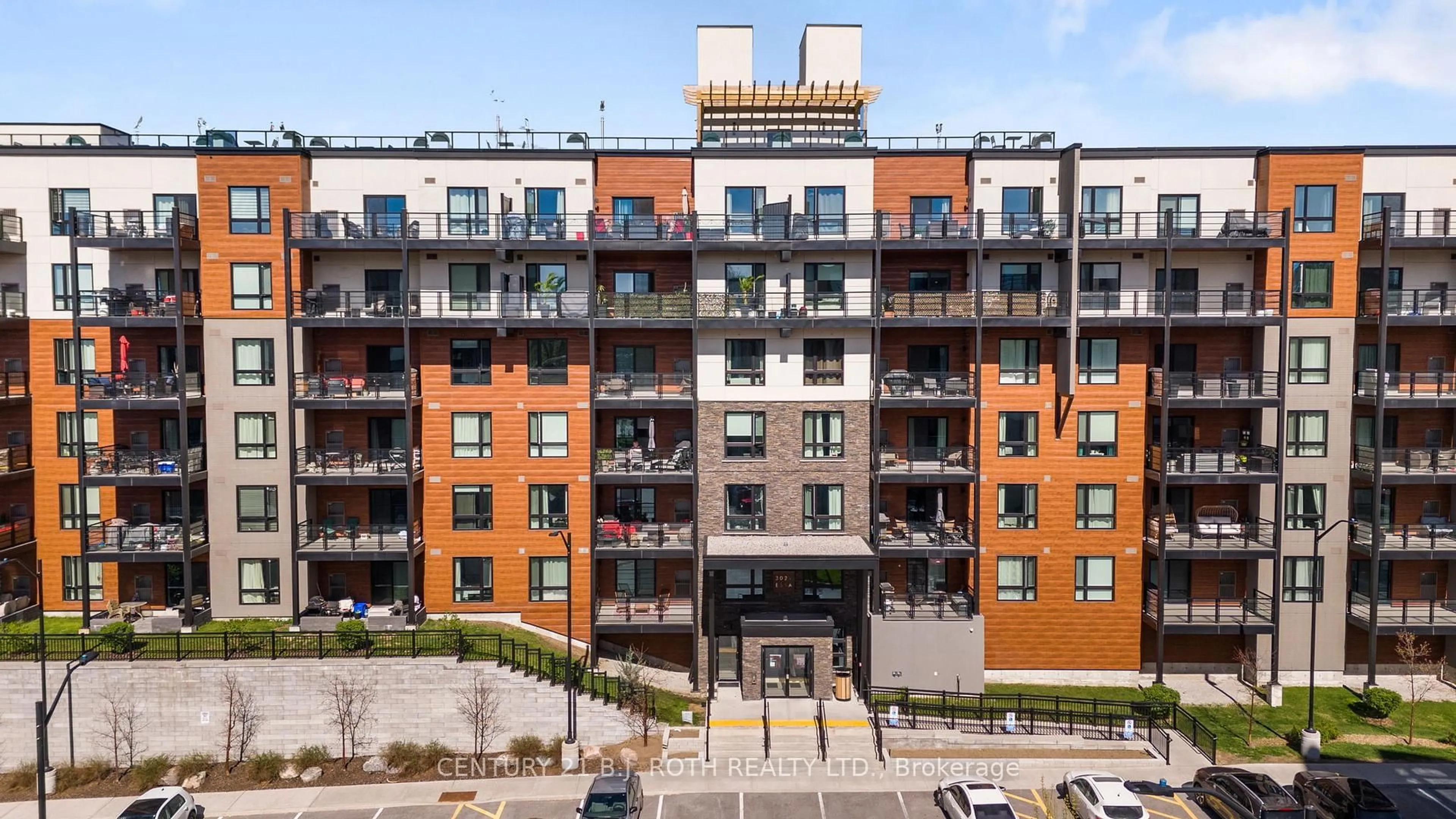 A pic from outside/outdoor area/front of a property/back of a property/a pic from drone, city buildings view from balcony for 302 ESSA Rd #115, Barrie Ontario L9J 0H3