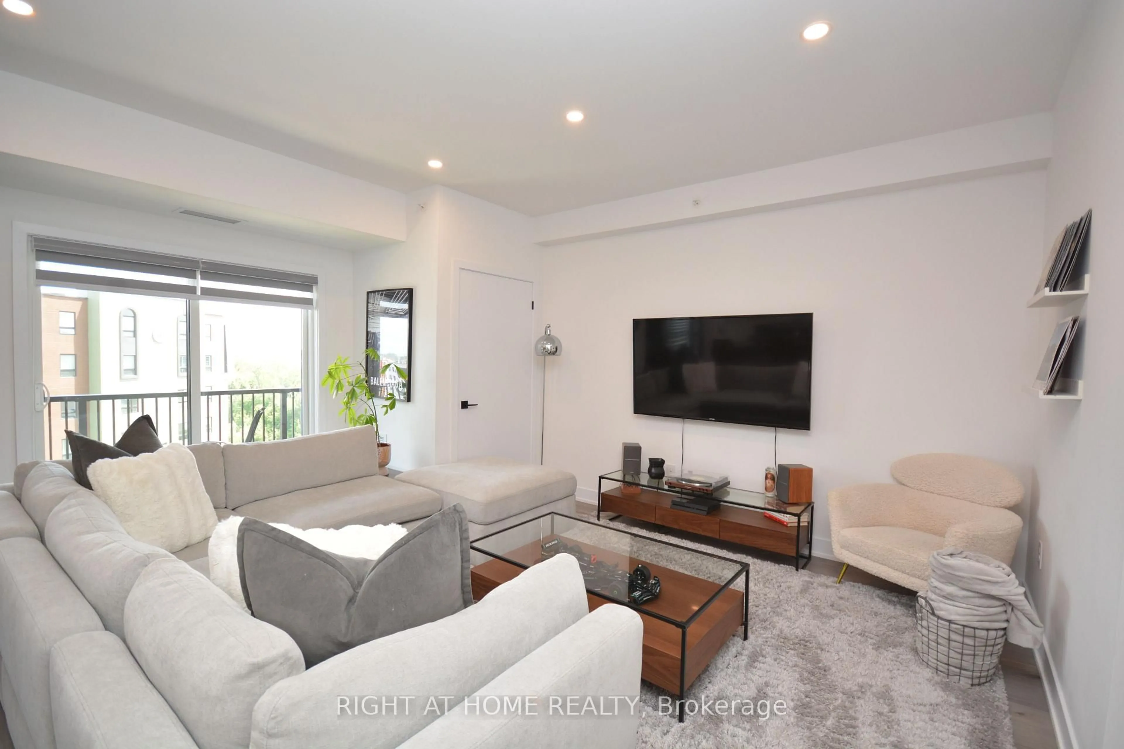 Living room with furniture, unknown for 8 Culinary Lane #411, Barrie Ontario L9J 0T2