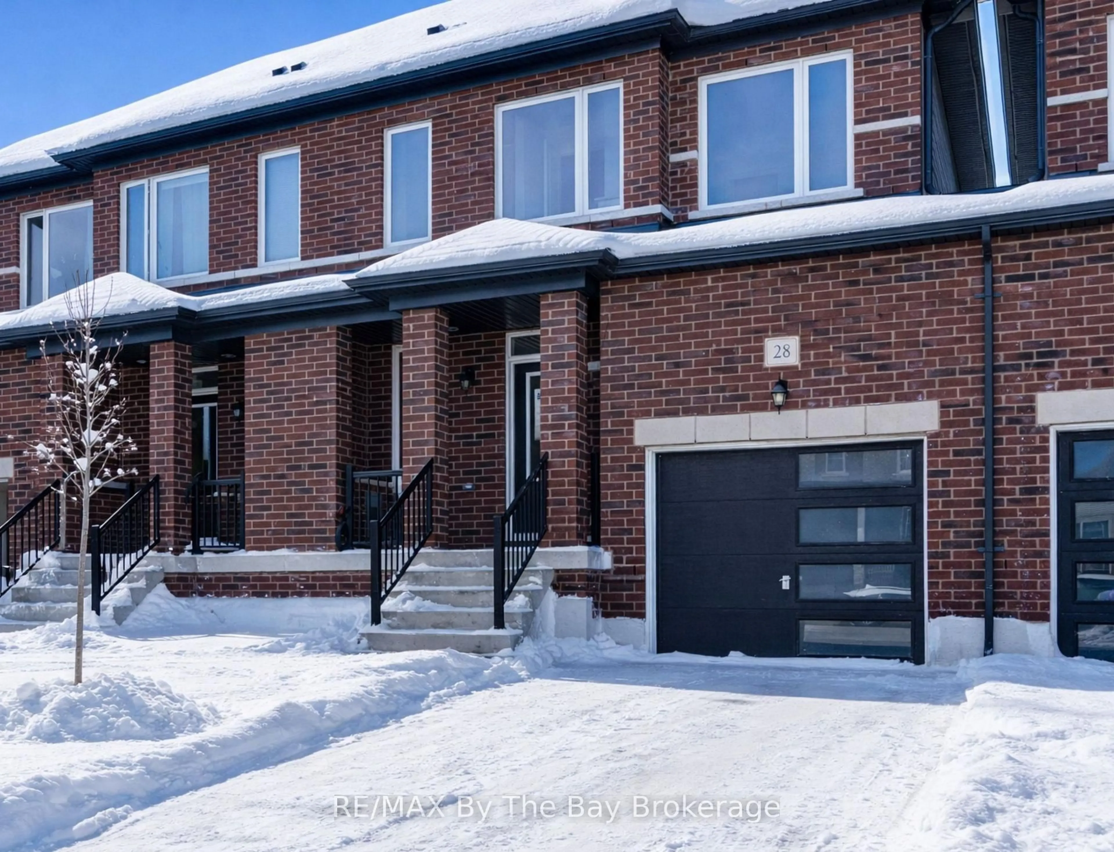 Home with brick exterior material, street for 28 Autumn Dr, Wasaga Beach Ontario L9Z 0K7
