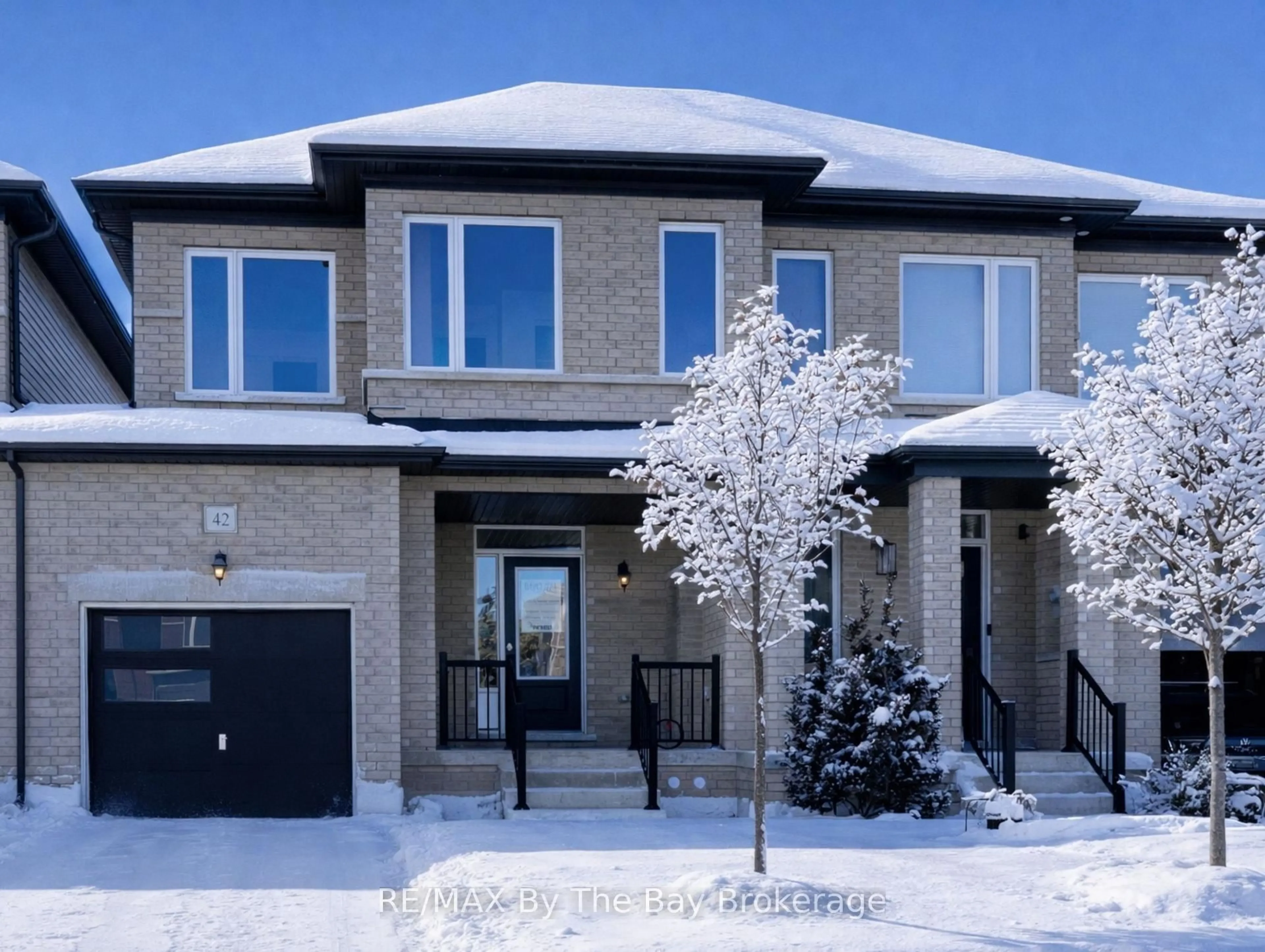 Home with brick exterior material, street for 42 Lisa St, Wasaga Beach Ontario L9Z 1J9