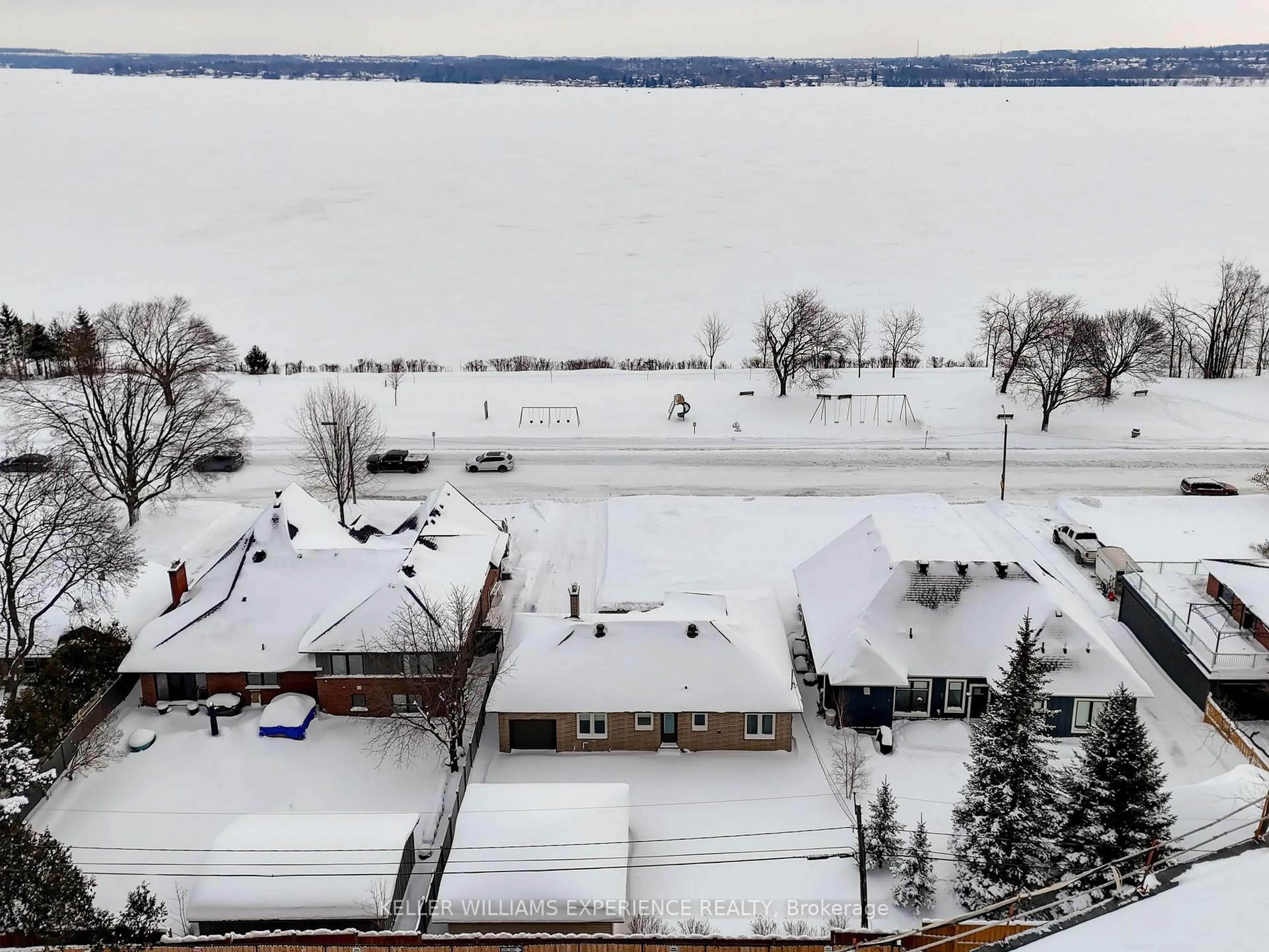 A pic from outside/outdoor area/front of a property/back of a property/a pic from drone, water/lake/river/ocean view for 68 Kempenfelt Dr, Barrie Ontario L4M 1C1