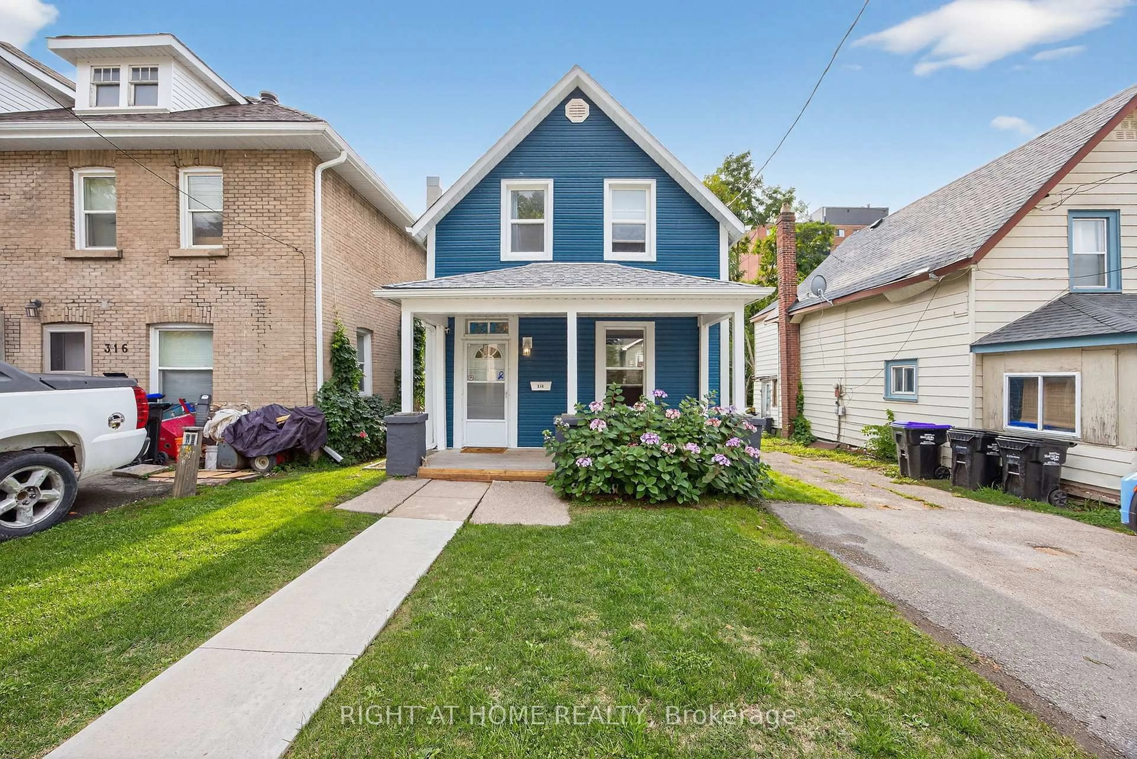 Home with brick exterior material, street for 314 Queen St, Midland Ontario L4R 3H4