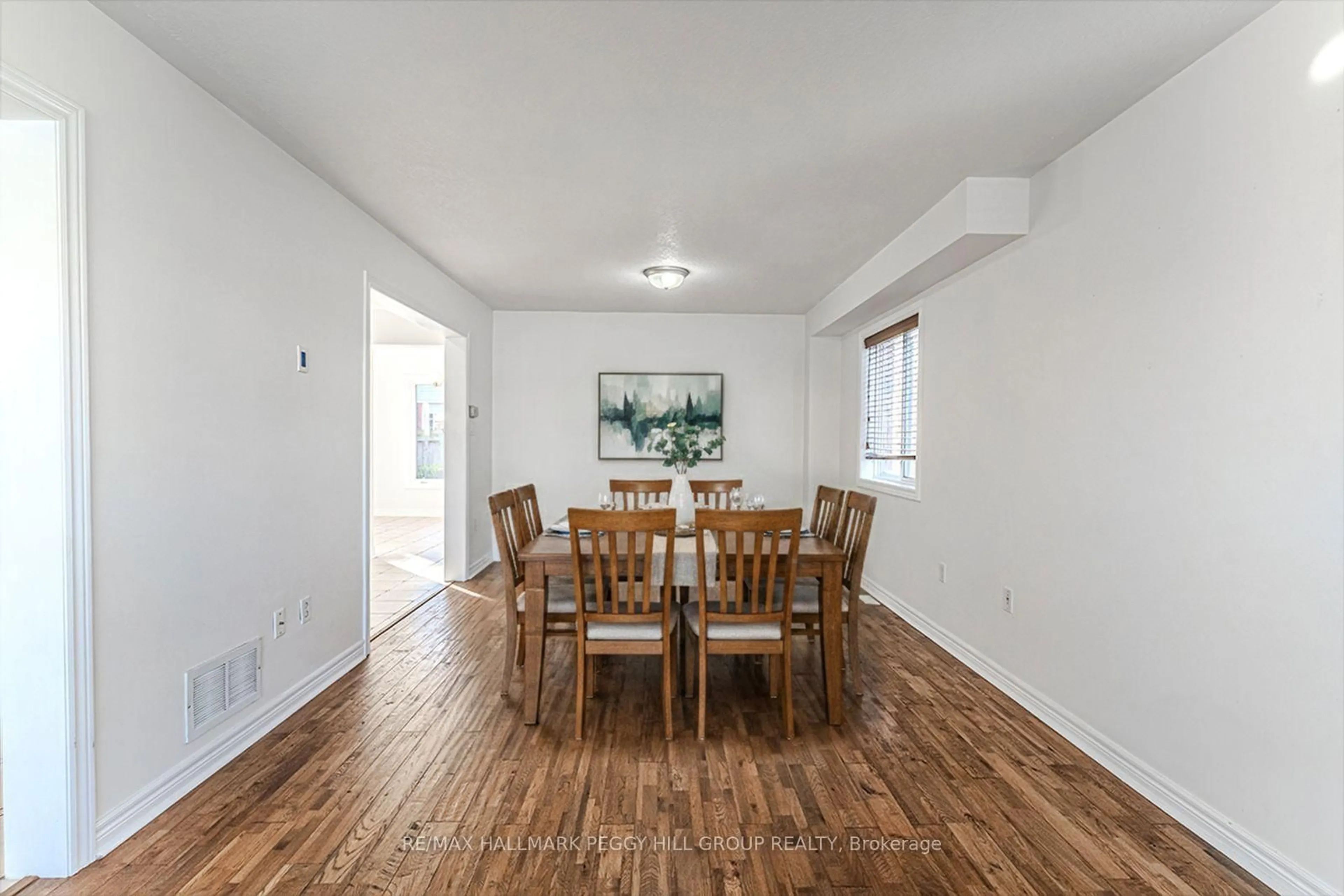 Dining room, wood/laminate floor for 29 Brookwood Dr, Barrie Ontario L4N 0Z1