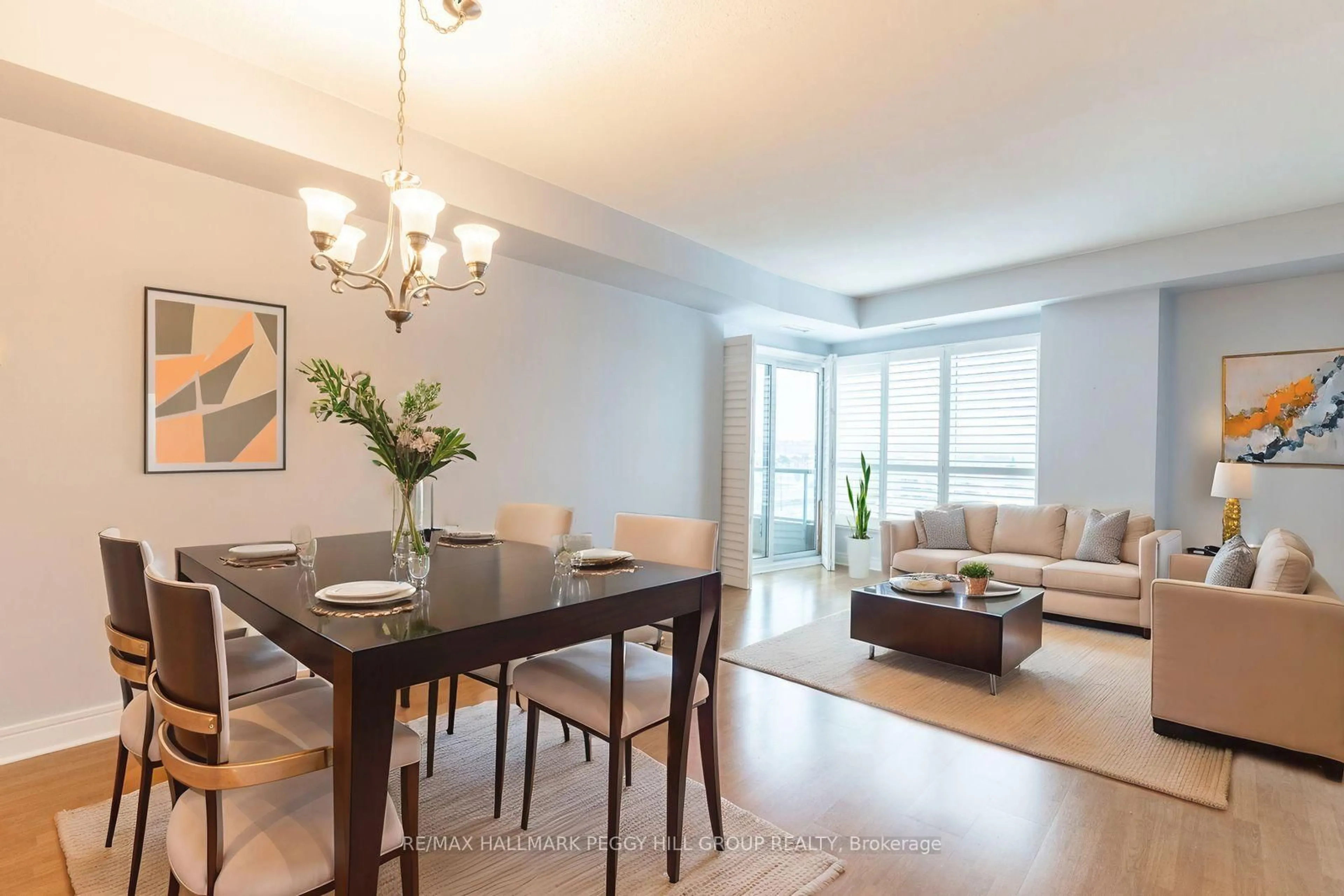 Dining room, wood/laminate floor for 2 Toronto St #401, Barrie Ontario L4N 9R2