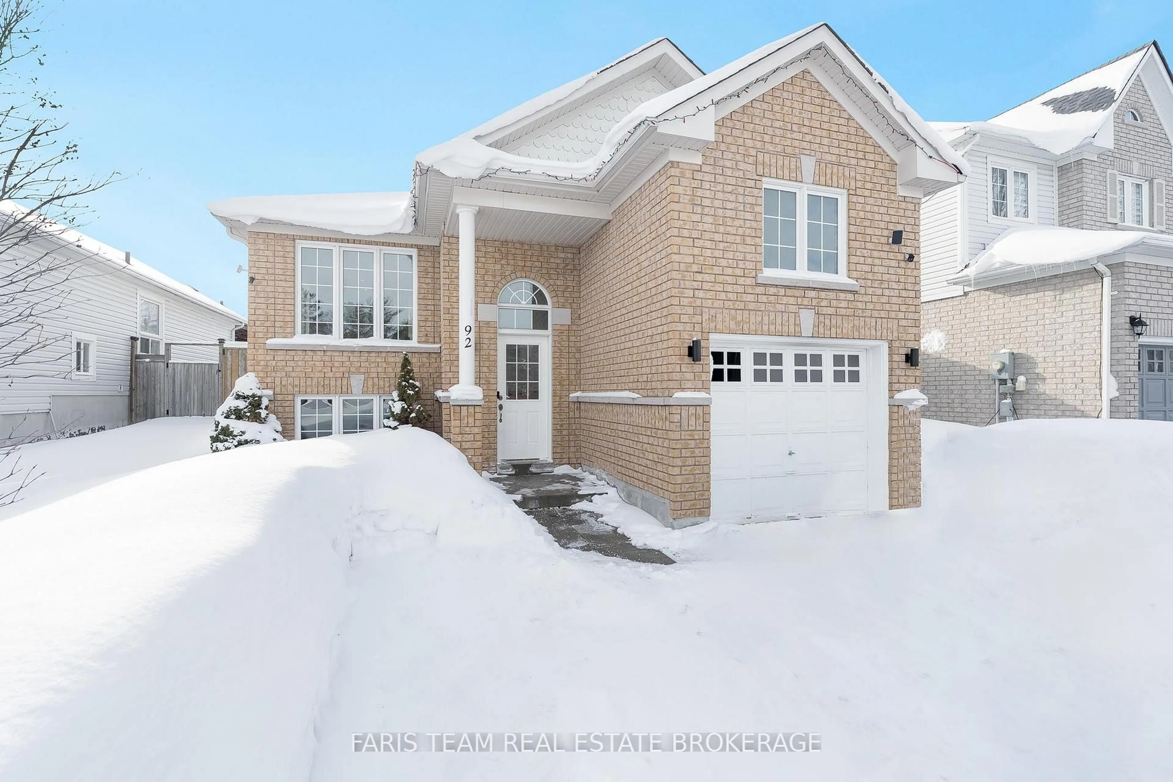 Home with brick exterior material, street for 92 Wesley Ave, Wasaga Beach Ontario L9Z 0B9