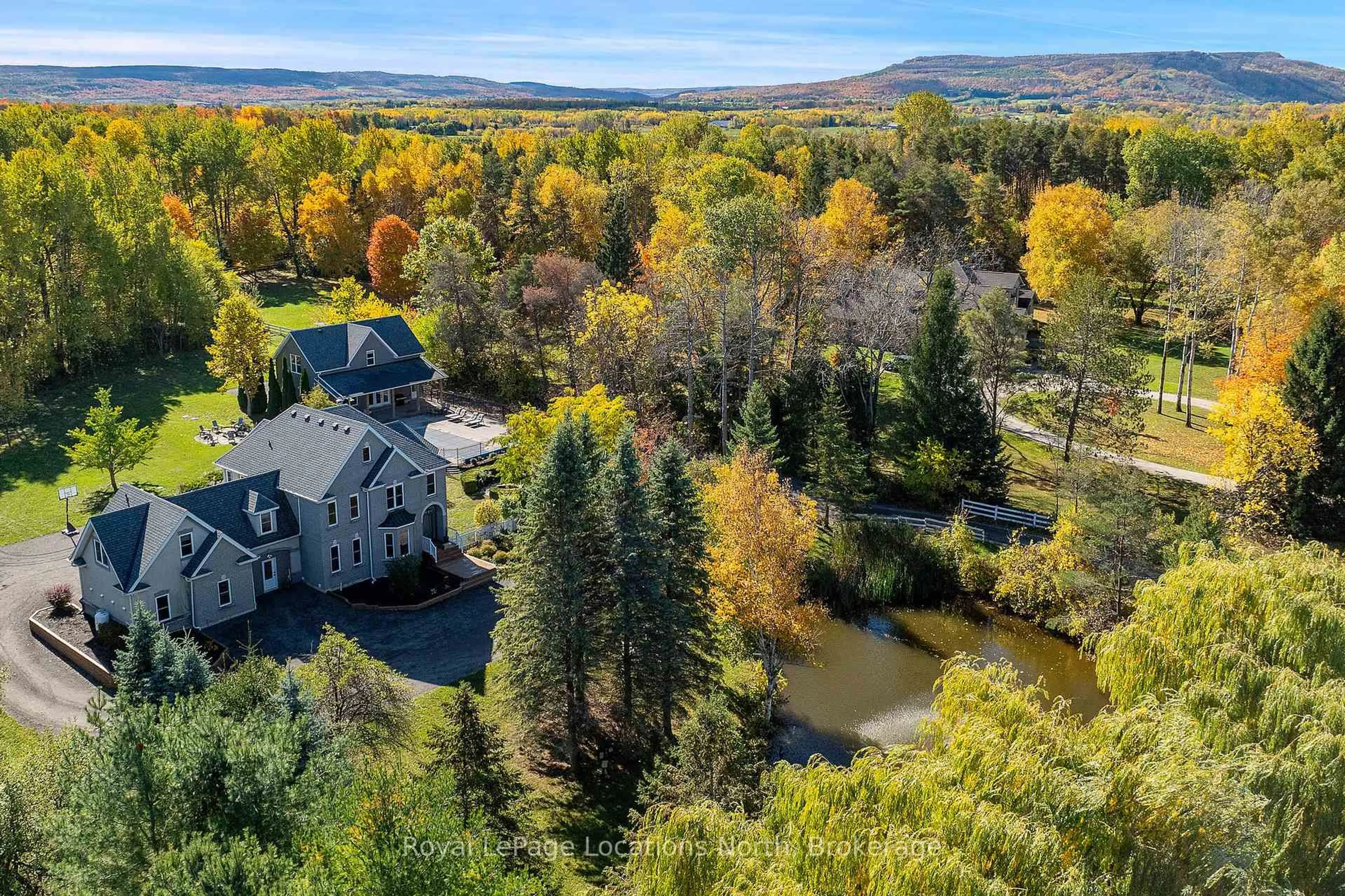 A pic from outside/outdoor area/front of a property/back of a property/a pic from drone, water/lake/river/ocean view for 7833 Poplar Sdrd, Clearview Ontario L9Y 5N4