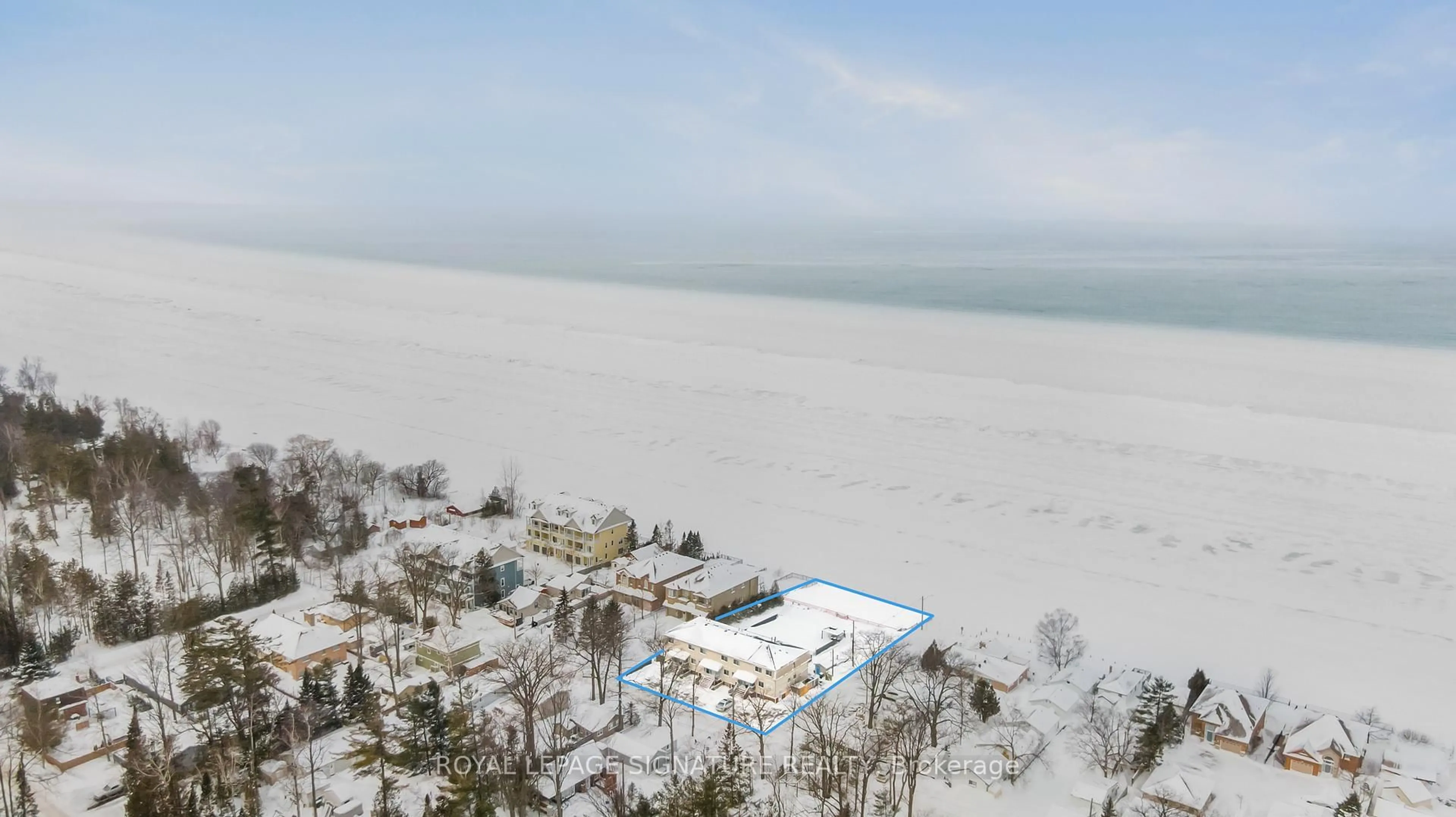 A pic from outside/outdoor area/front of a property/back of a property/a pic from drone, water/lake/river/ocean view for 734 Shore Lane #6, Wasaga Beach Ontario L9Z 2C7