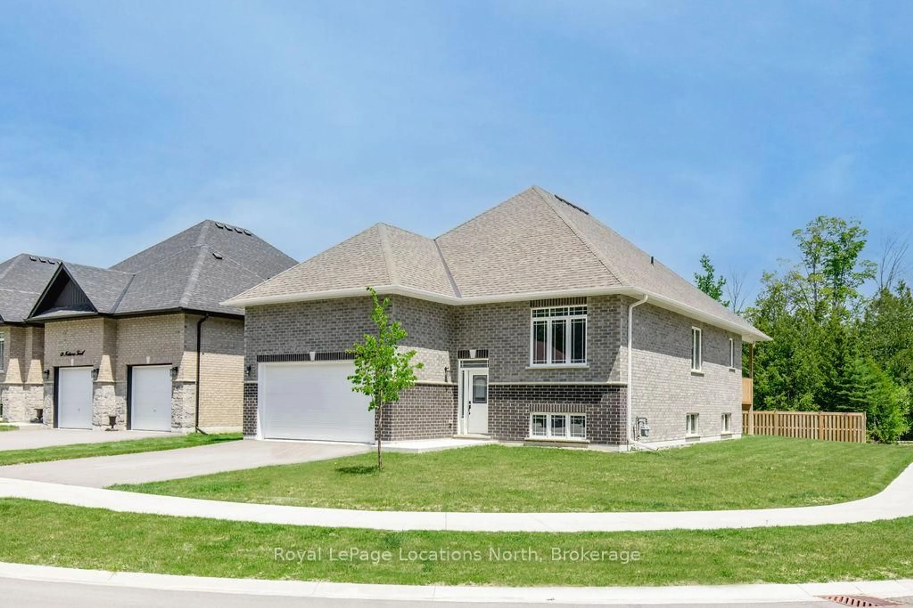 Home with brick exterior material, street for 51 NATURES Tr, Wasaga Beach Ontario L9Z 0H4