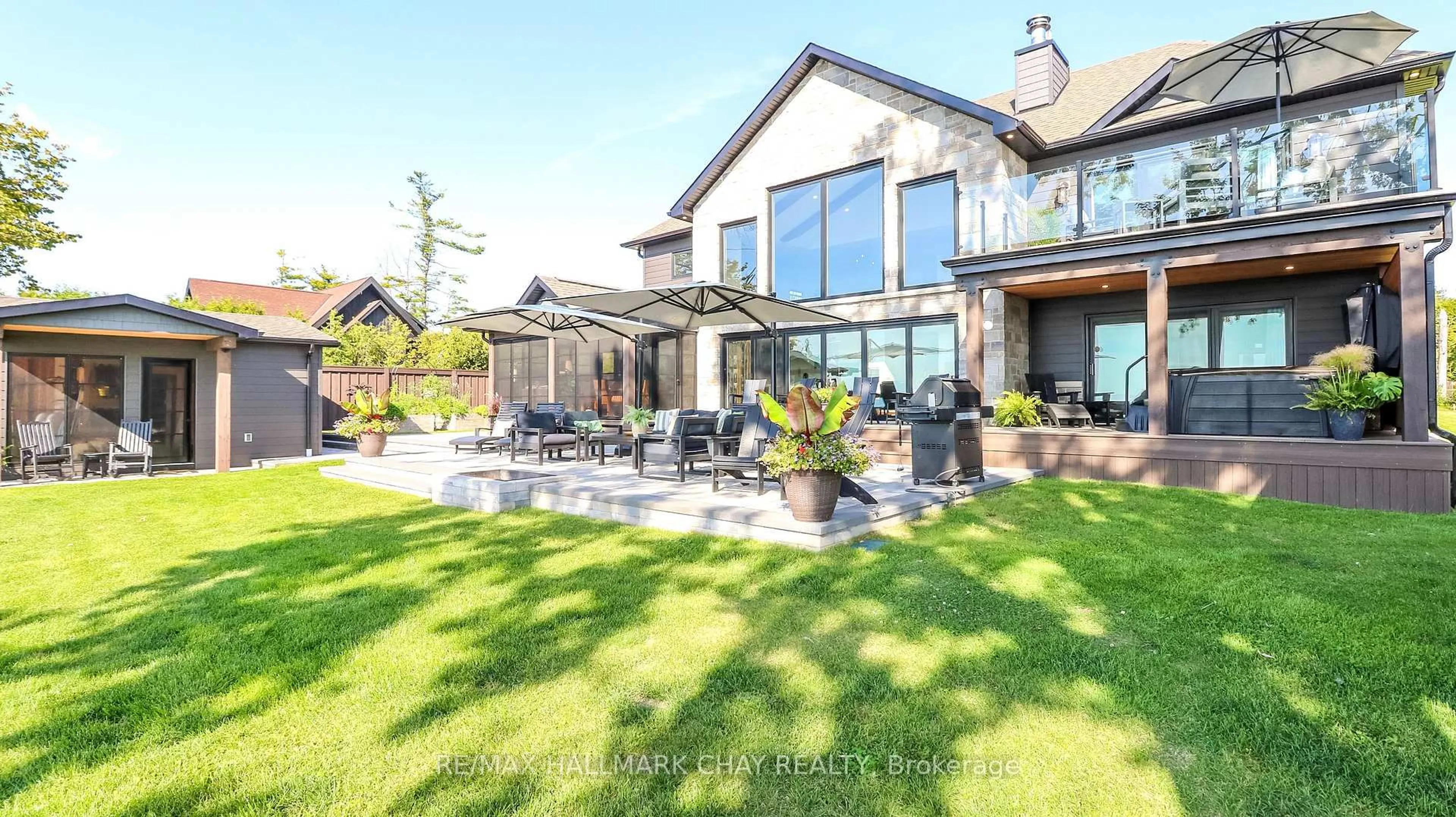 A pic from outside/outdoor area/front of a property/back of a property/a pic from drone, unknown for 1 Sunnyside Ave, Oro-Medonte Ontario L0L 2E0