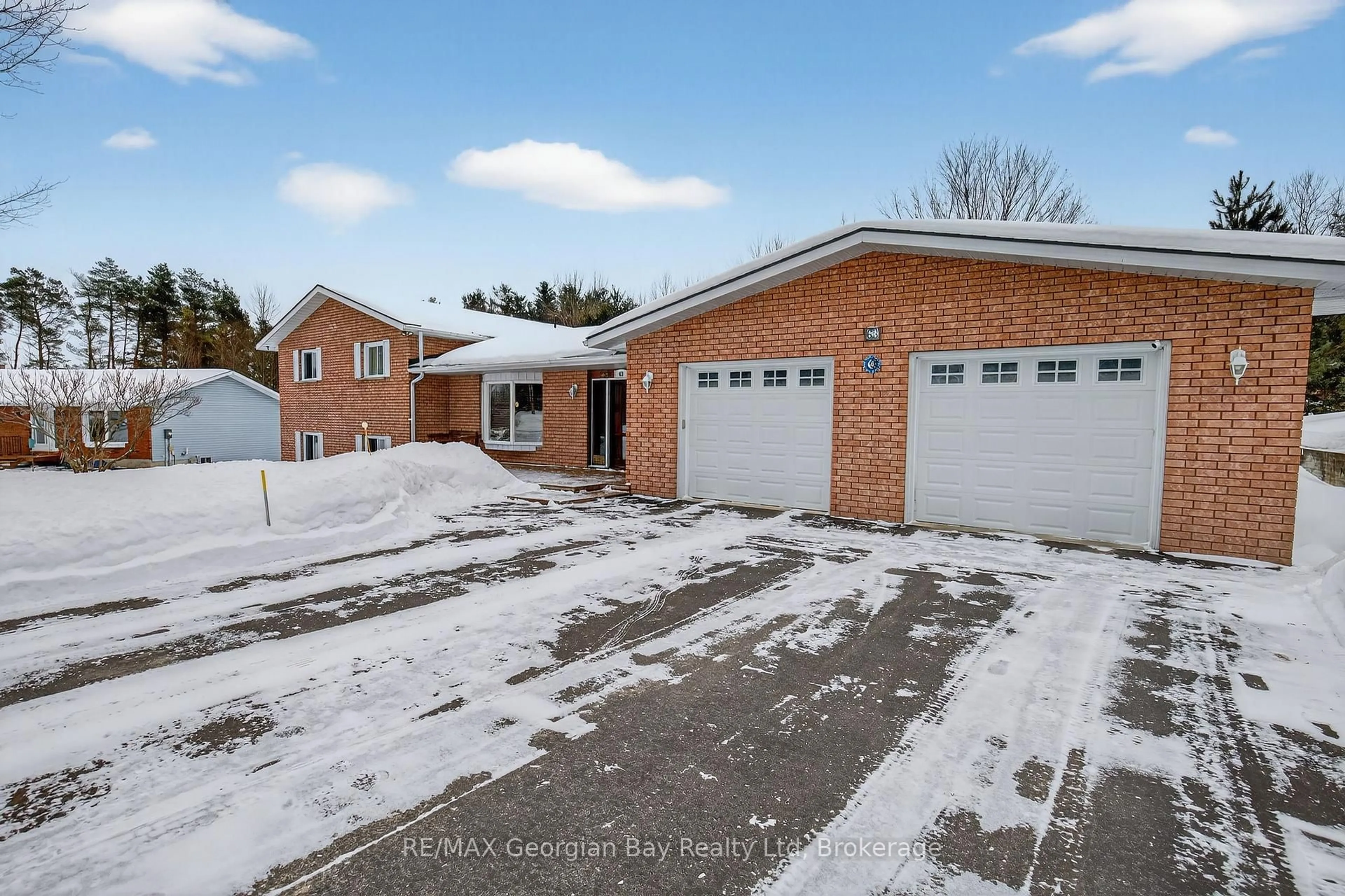 A pic from outside/outdoor area/front of a property/back of a property/a pic from drone, street for 63 Lepage Dr, Penetanguishene Ontario L9M 1R5