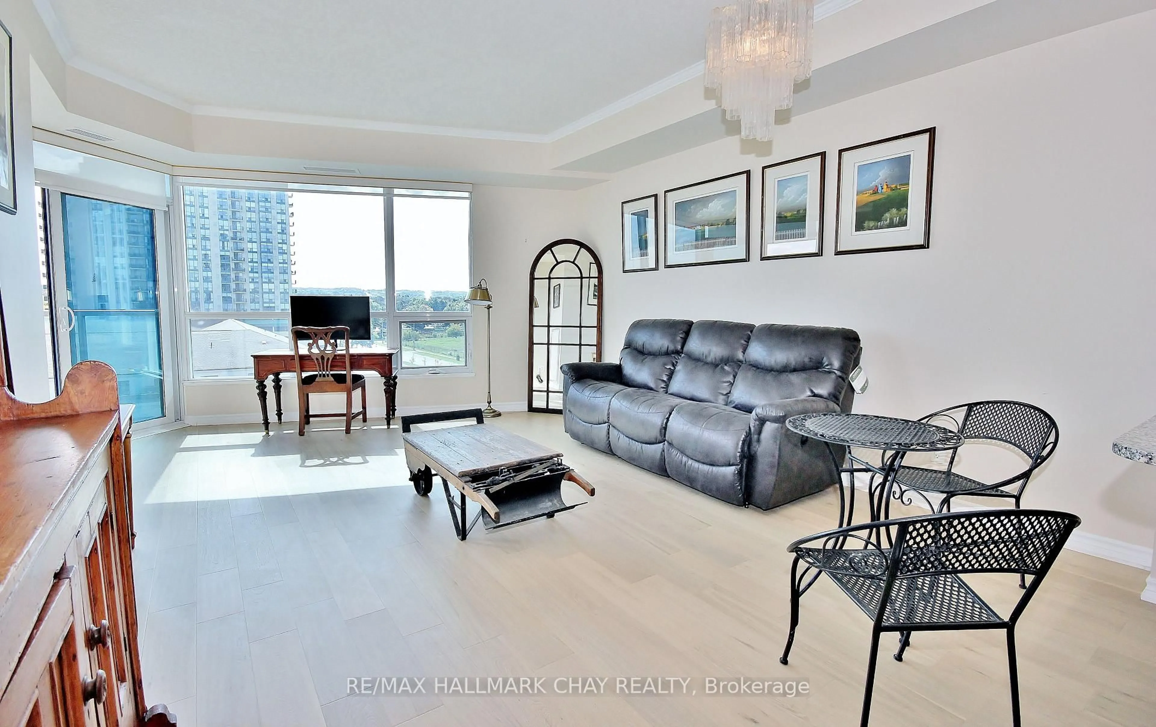 Living room with furniture, unknown for 37 Ellen St #511, Barrie Ontario L4N 6G2