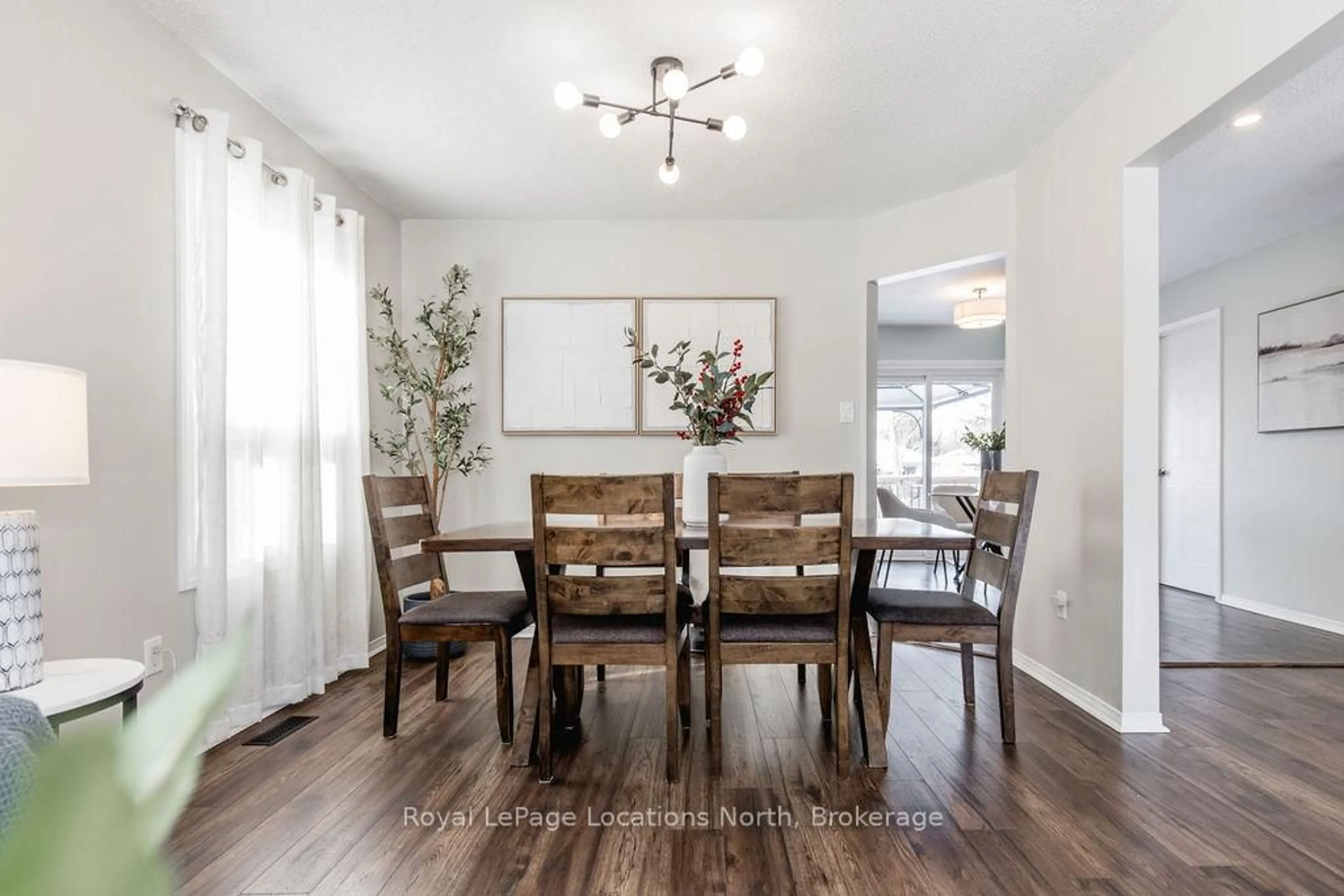 Dining room, wood/laminate floor for 52 ROYAL BEECH Dr, Wasaga Beach Ontario L0L 2P0