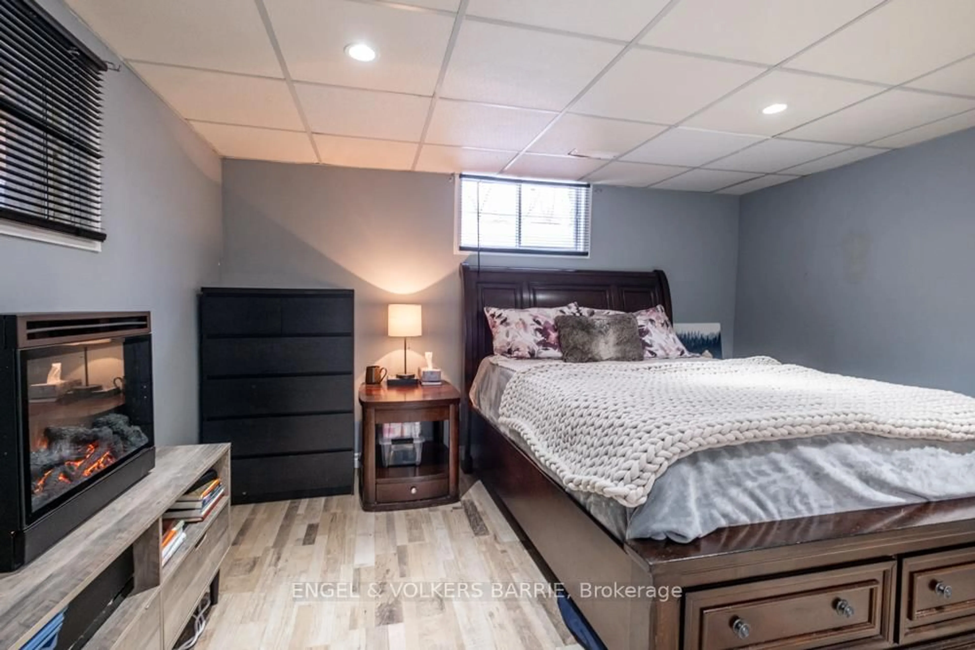 Bedroom with bed, wood/laminate floor for 1065 Snow Valley Rd, Springwater Ontario L9X 0V5