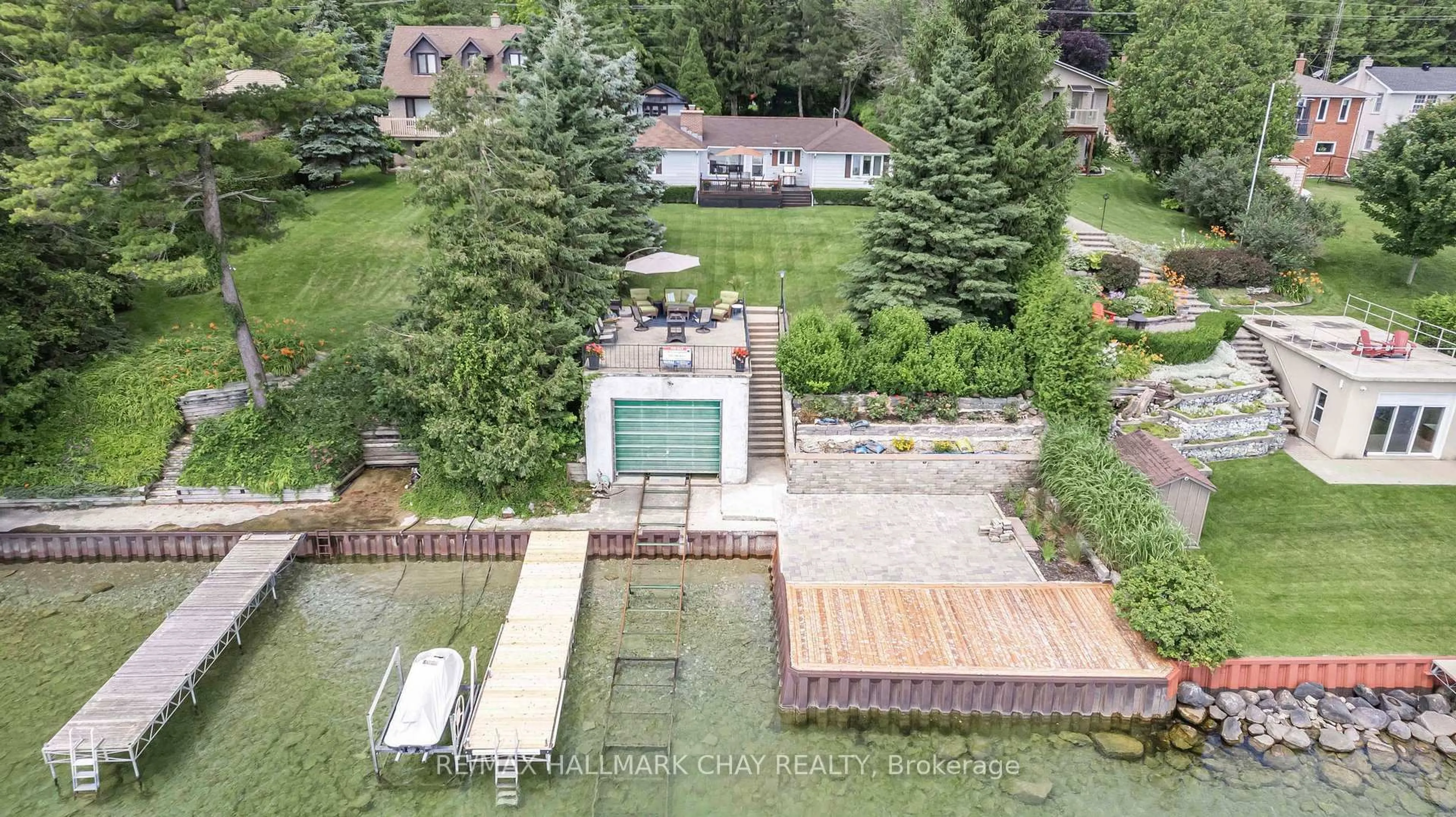 A pic from outside/outdoor area/front of a property/back of a property/a pic from drone, water/lake/river/ocean view for 1125 Woodland Dr, Oro-Medonte Ontario L3V 6H1