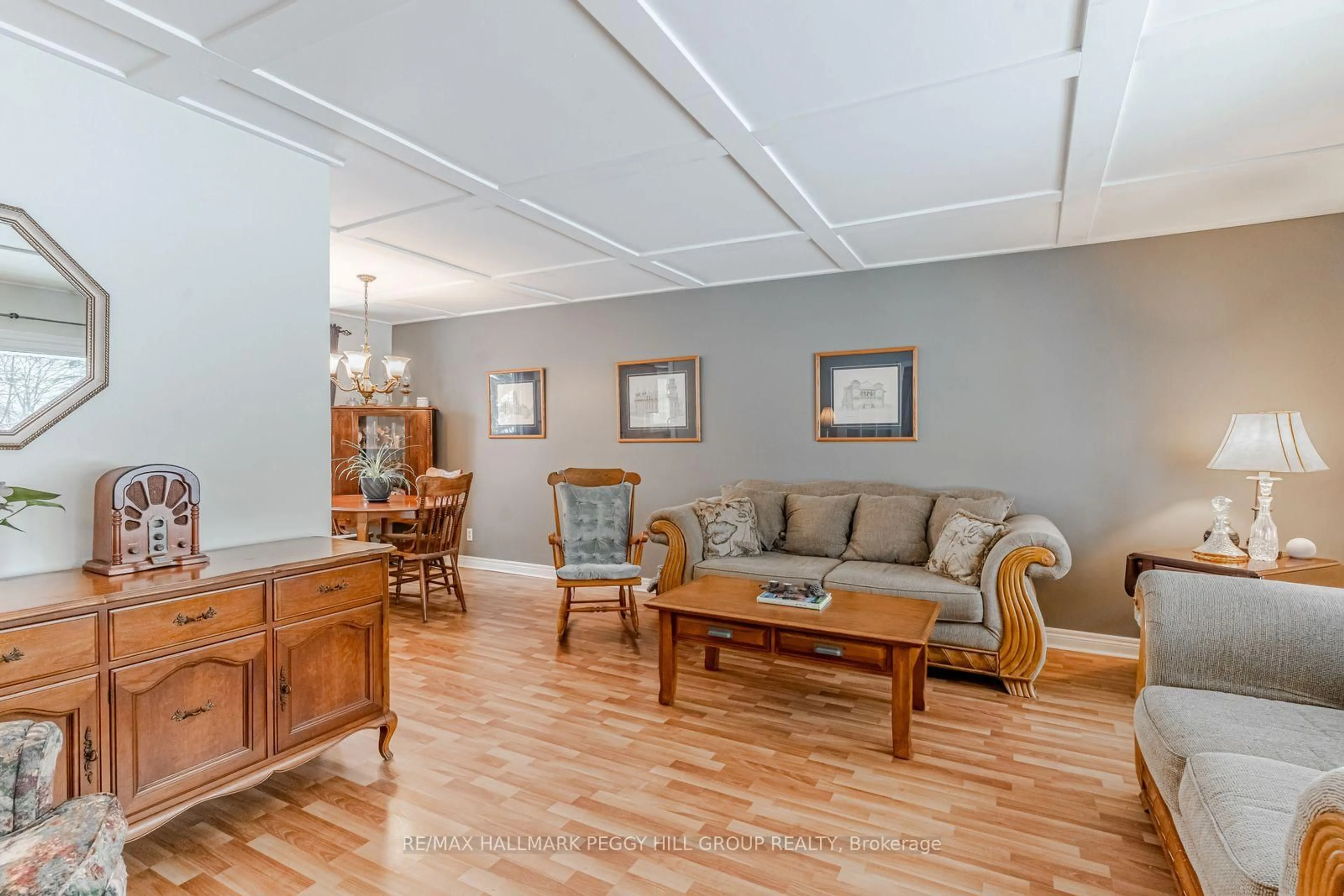 Living room with furniture, wood/laminate floor for 229 Deborah Way, Barrie Ontario L4N 4N8