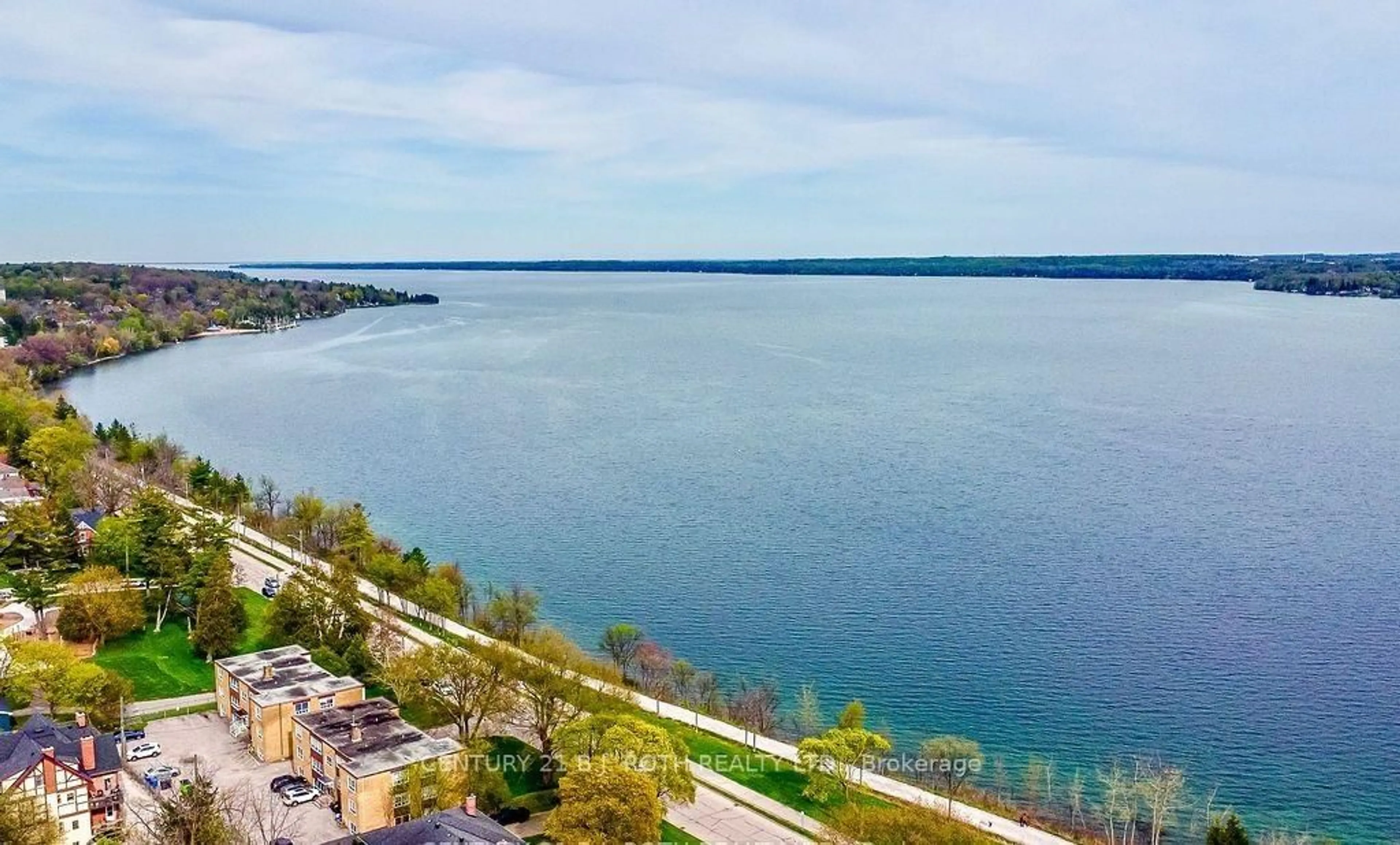 A pic from outside/outdoor area/front of a property/back of a property/a pic from drone, water/lake/river/ocean view for 181 Collier St #405, Barrie Ontario L4M 5L6