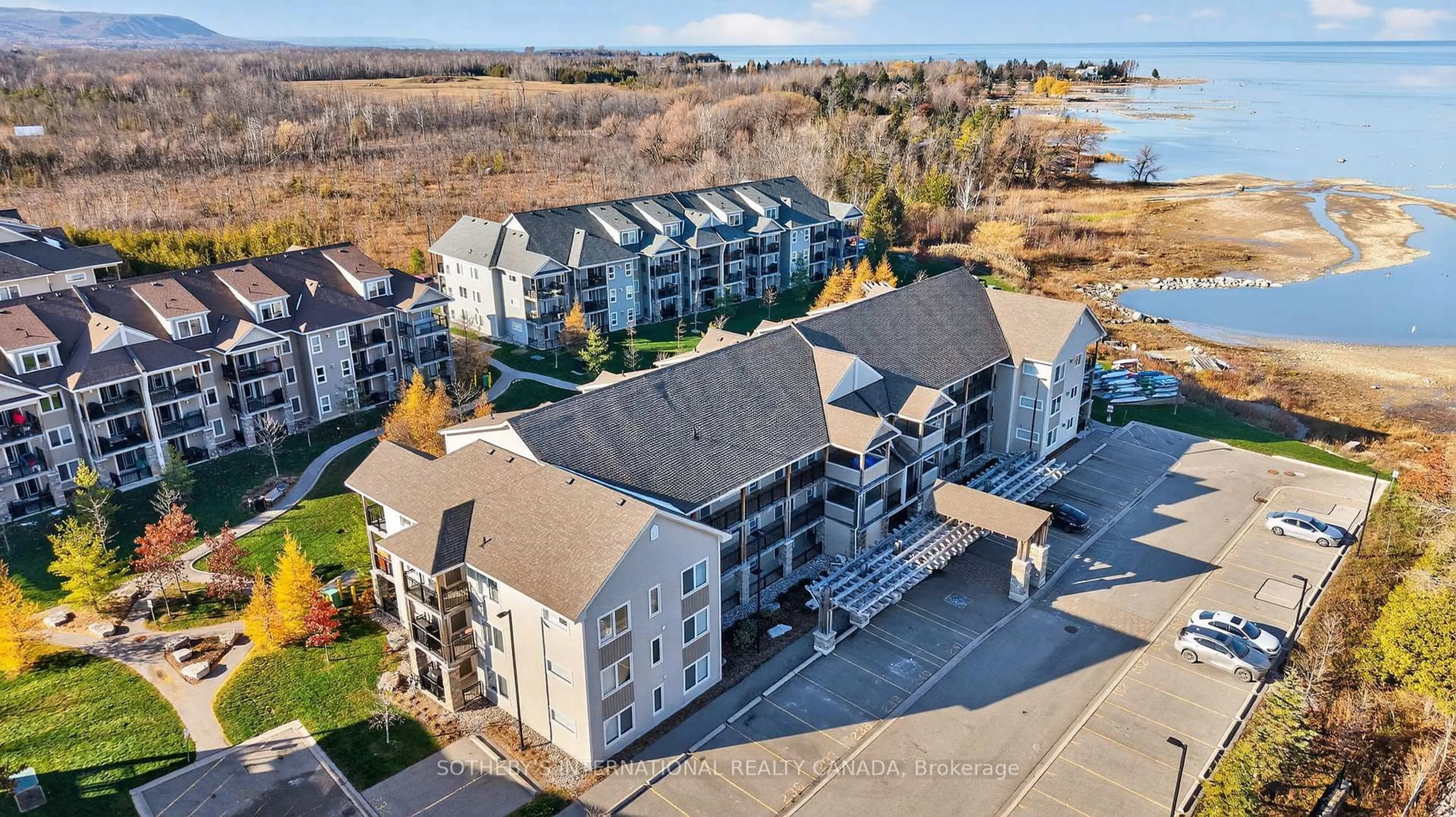 A pic from outside/outdoor area/front of a property/back of a property/a pic from drone, water/lake/river/ocean view for 4 Cove Crt #307, Collingwood Ontario L9Y 0Y6