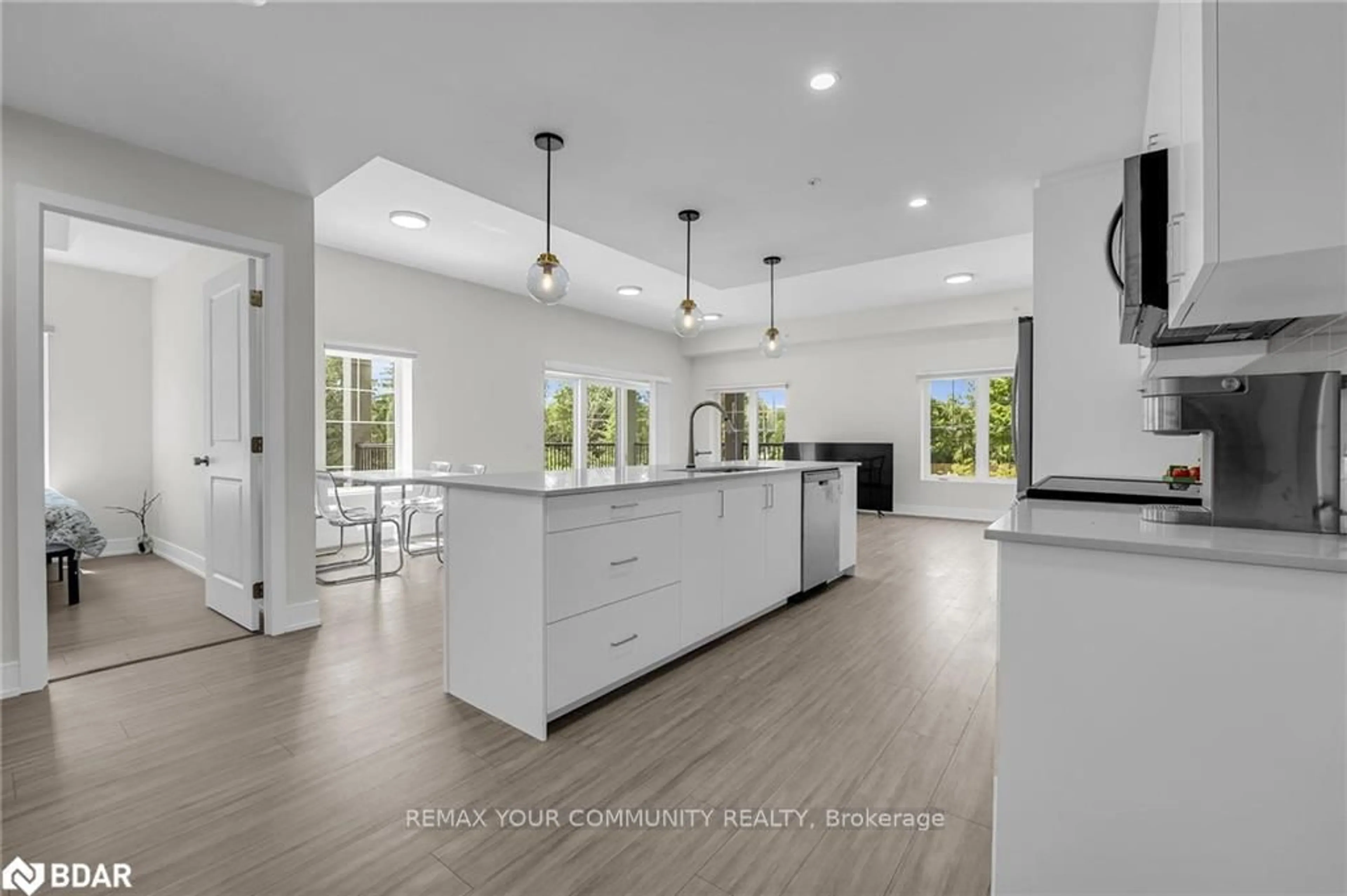 Open concept kitchen, ceramic/tile floor for 121 Mary St #211, Clearview Ontario L0M 1G0