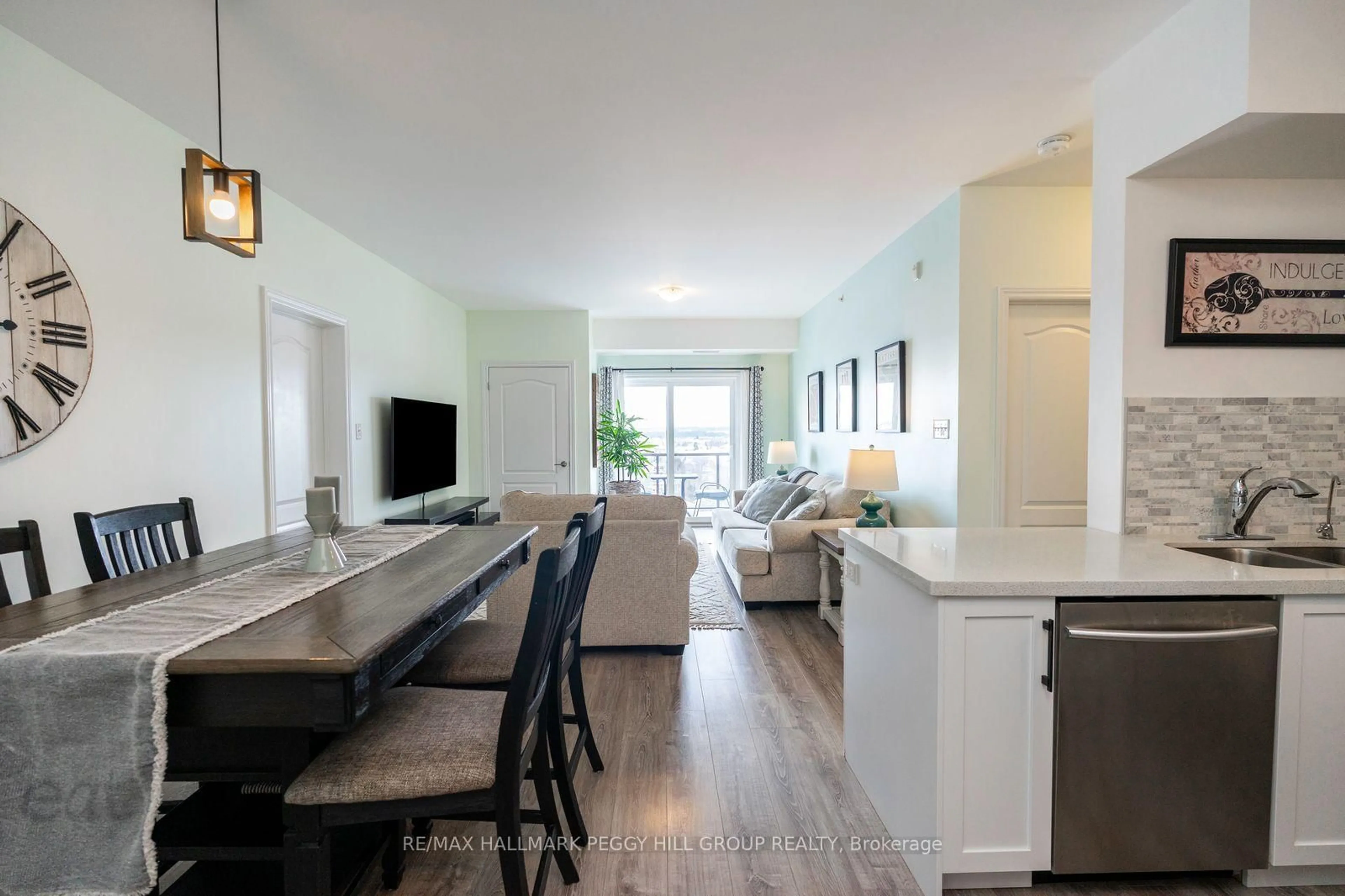 Open concept kitchen, wood/laminate floor for 100 Dean Ave #410, Barrie Ontario L9J 0H1